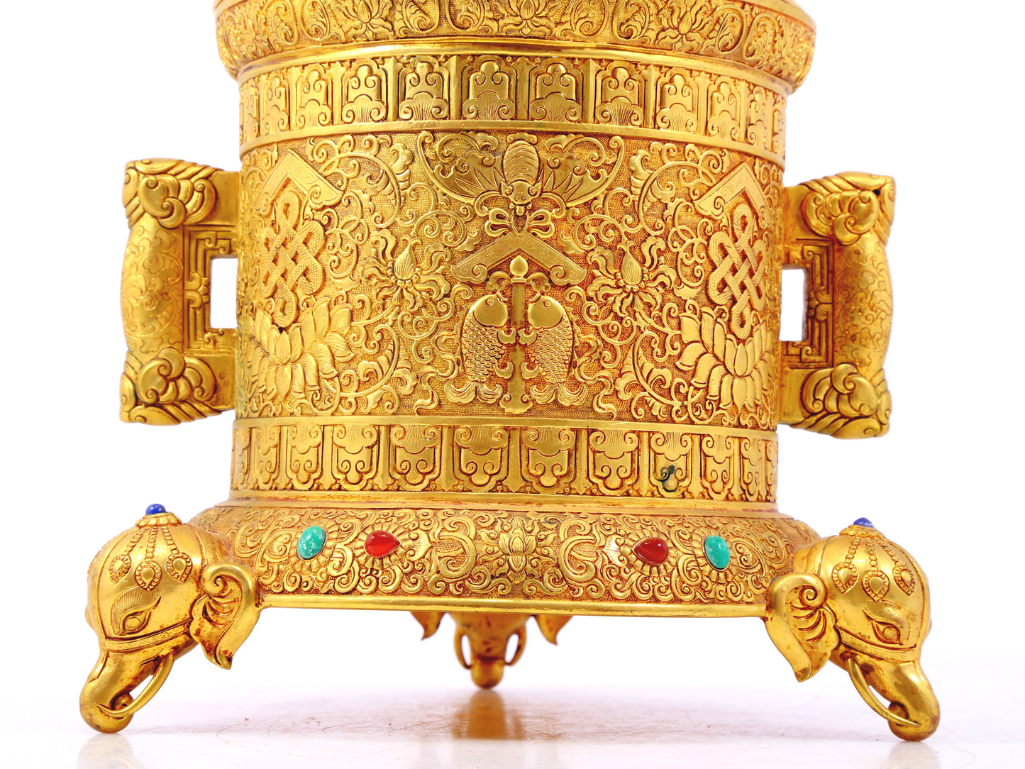 An exquisite gilt bronze double-eared tripod jar with a lid inlaid with hundreds of treasures and entwined lotus patterns.