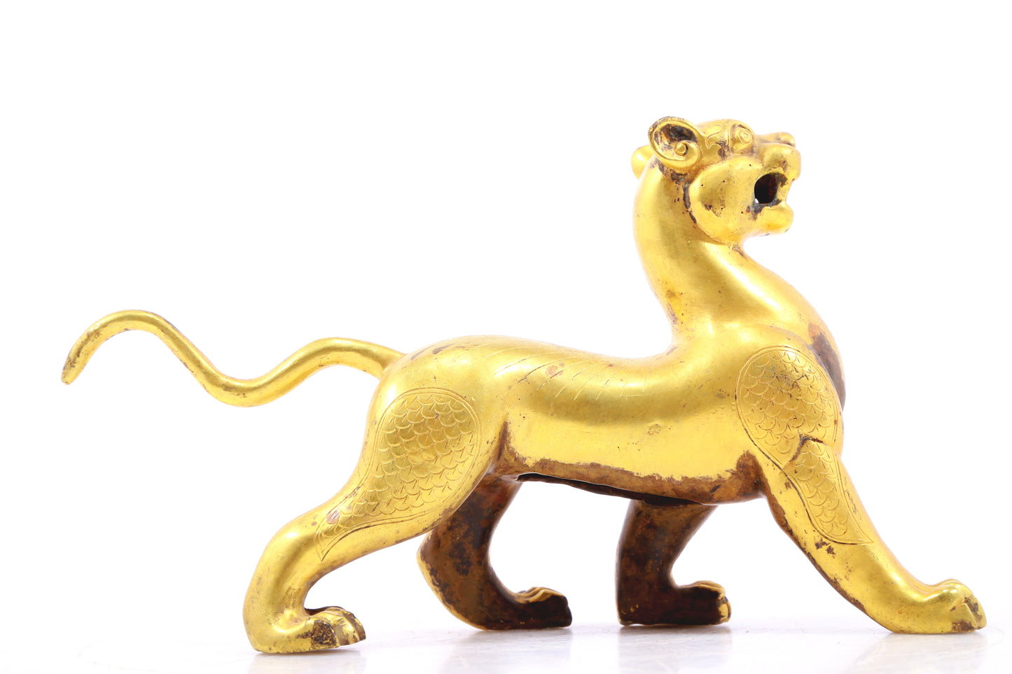 An exquisite gilt bronze leopard ornament