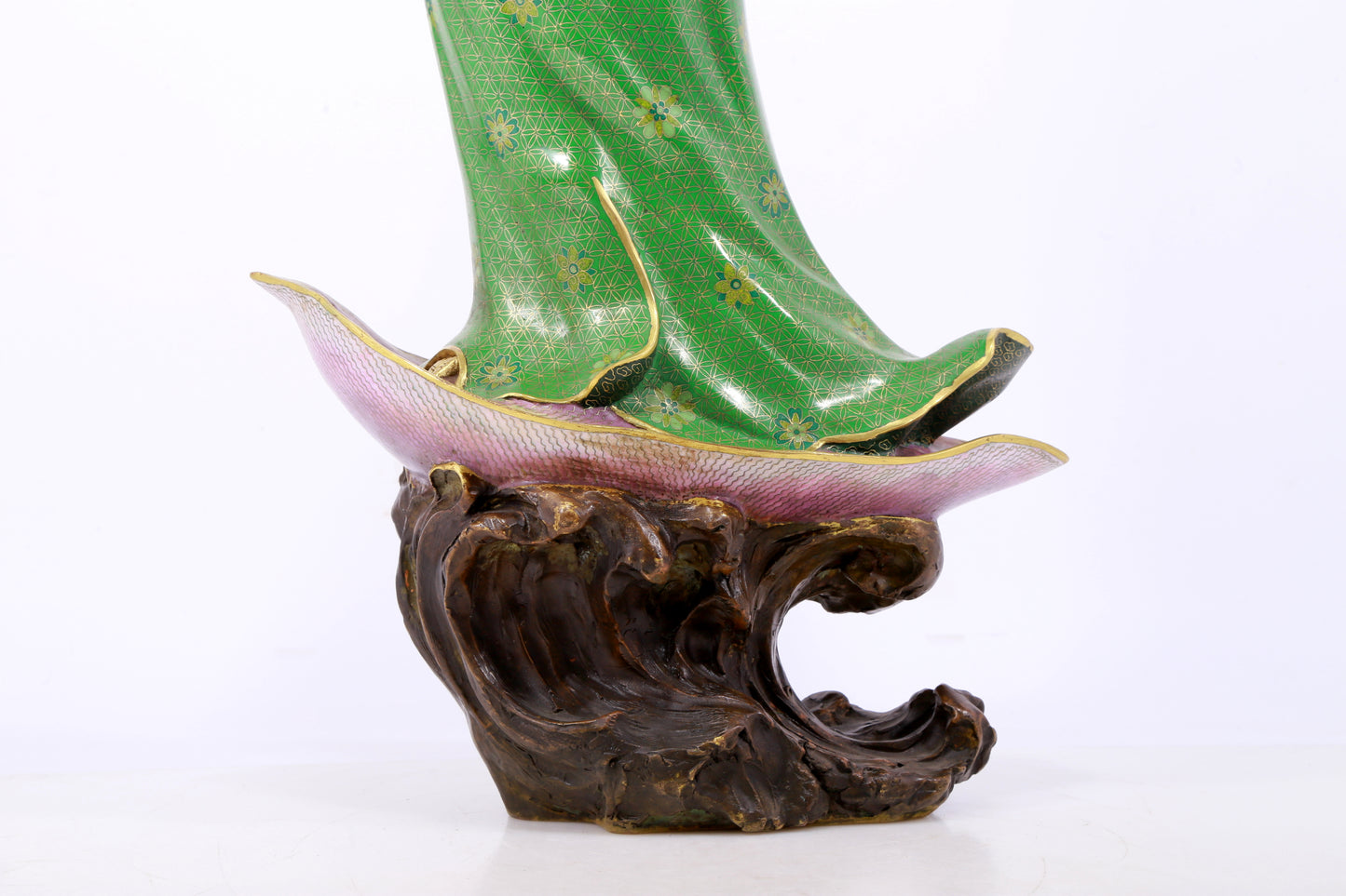 A serene cloisonné statue of Guanyin