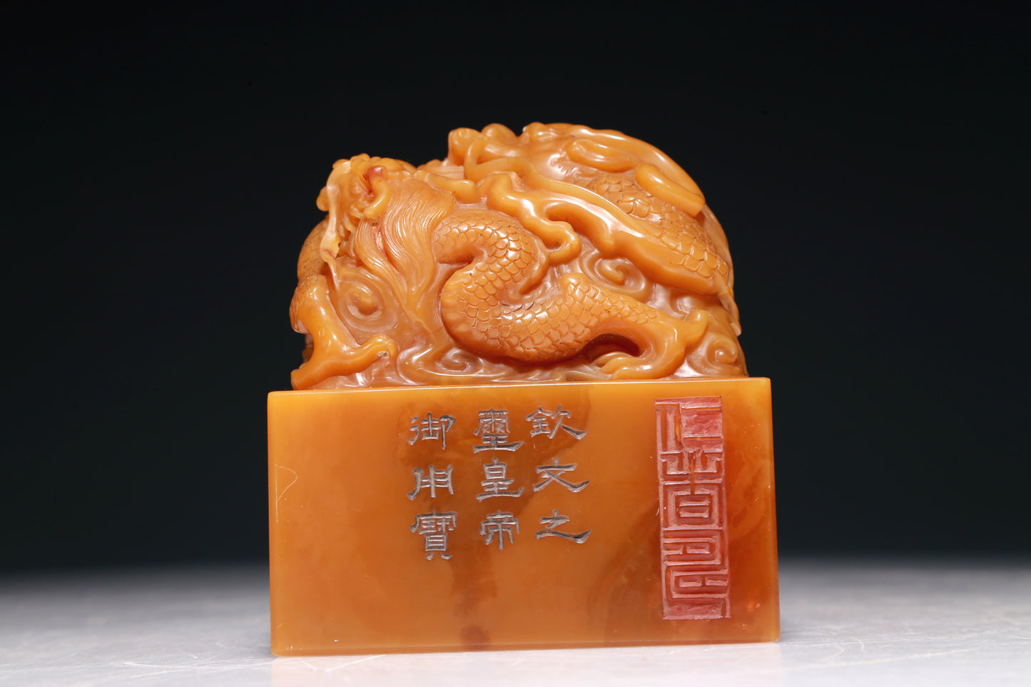 An Exquisite Tianhuang Stone 'Dragon' Seal With A Soapstone Gilded 'Ocean' Stand And A Wooden Gilded Polychrome 'Dragon' Box