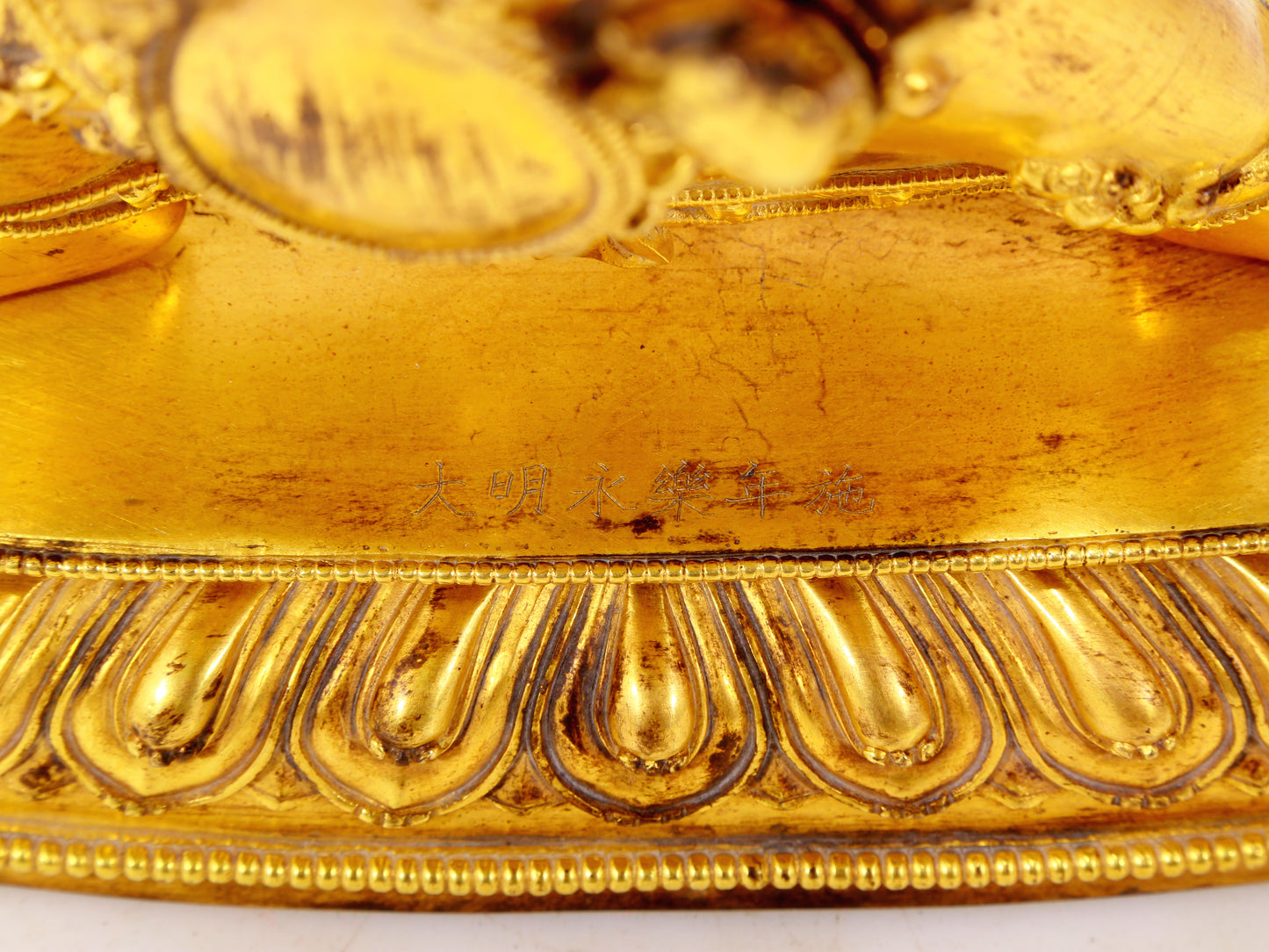 A solemn gilt bronze Vajra statue