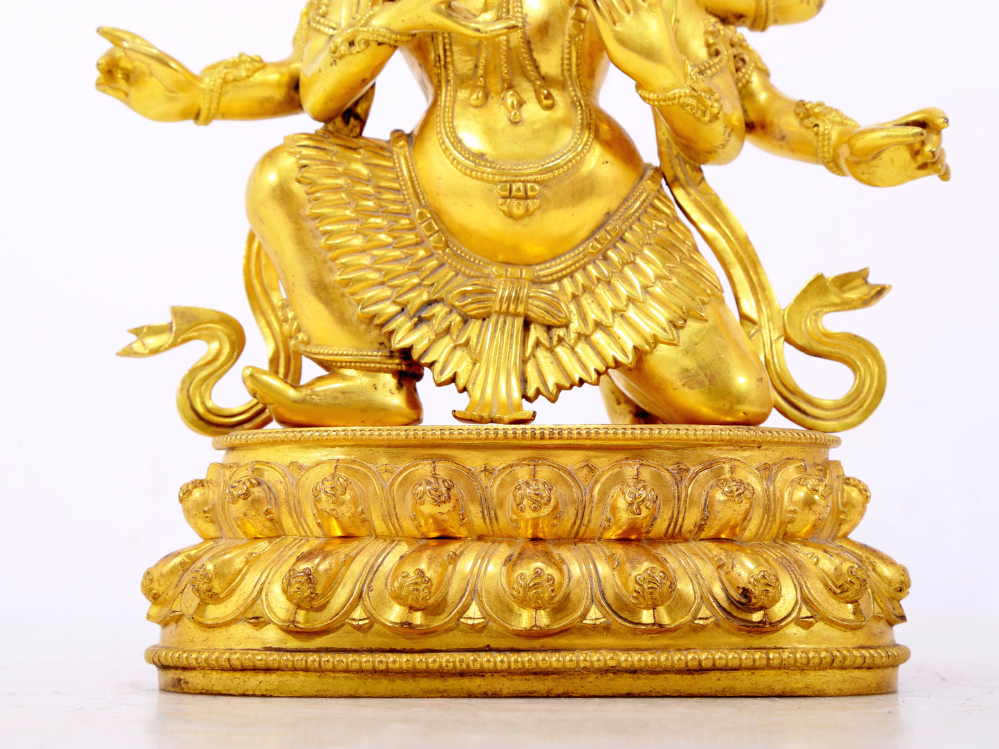 A solemn gilt bronze Vajra statue