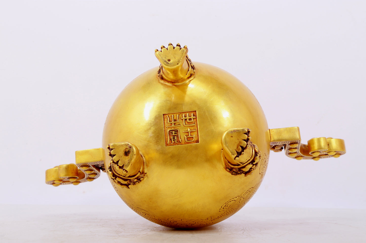 A pair of exquisite gilt bronze phoenix and flower pattern double-eared and three-legged incense burners