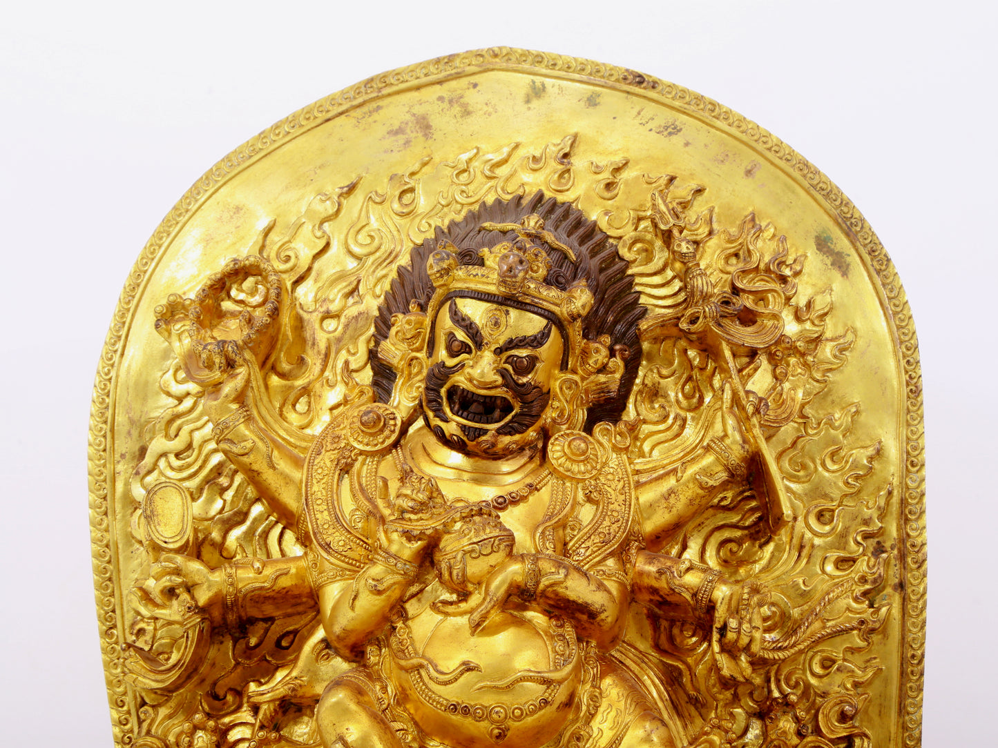 A solemn gilt bronze Vajra statue