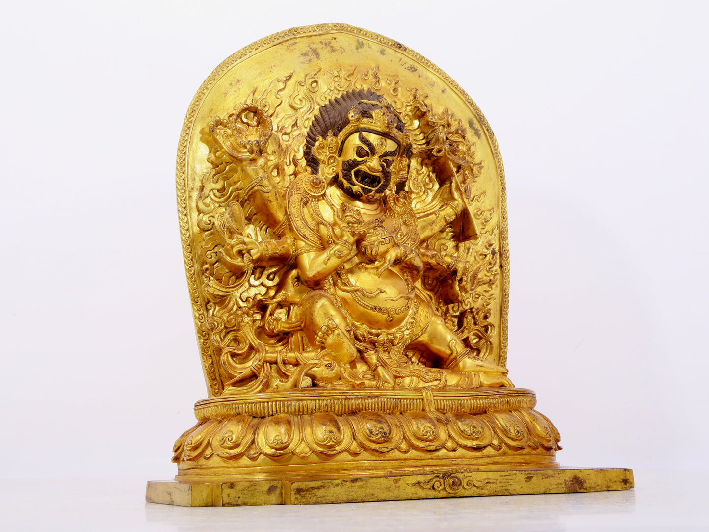 A solemn gilt bronze Vajra statue