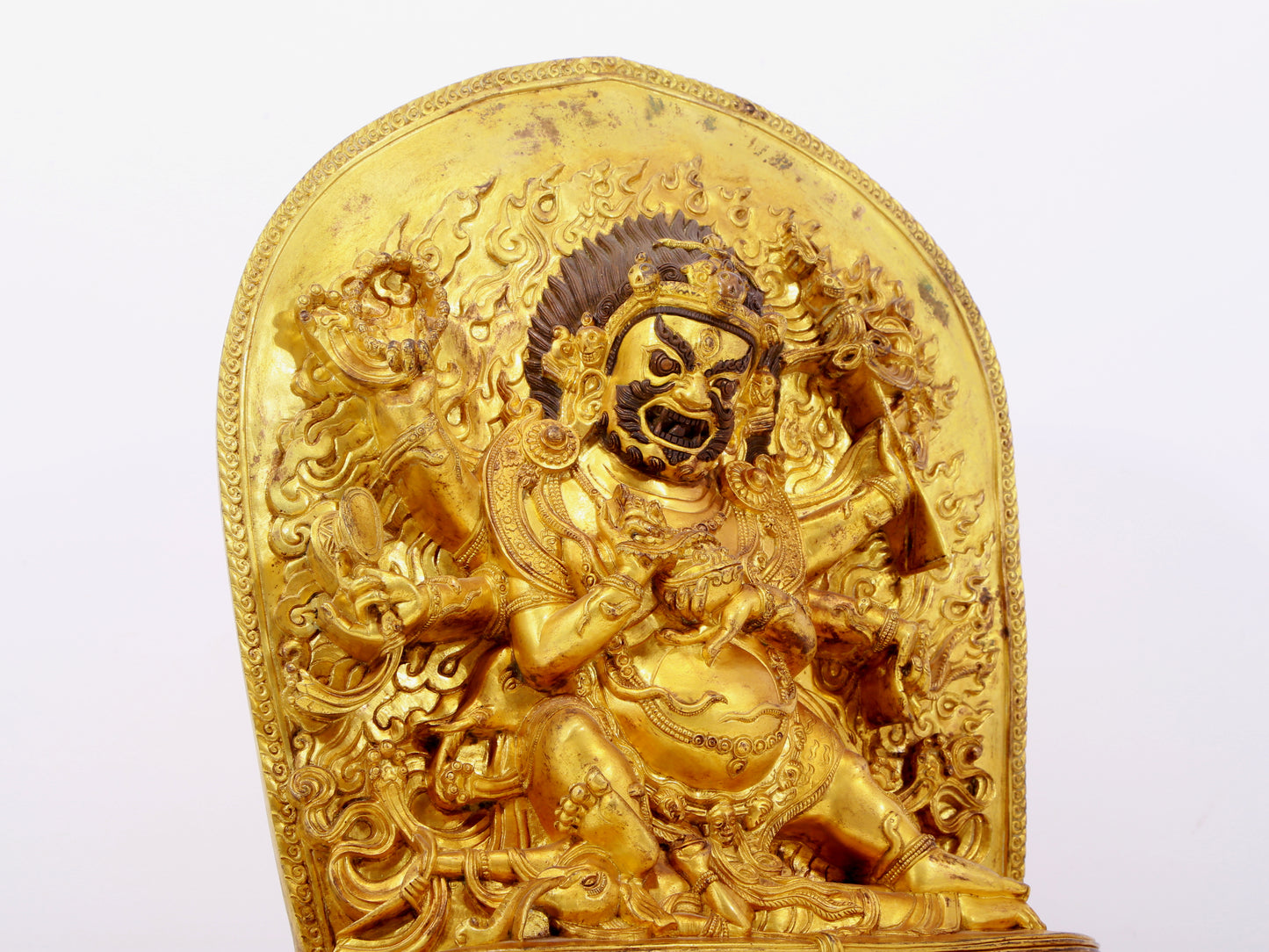 A solemn gilt bronze Vajra statue