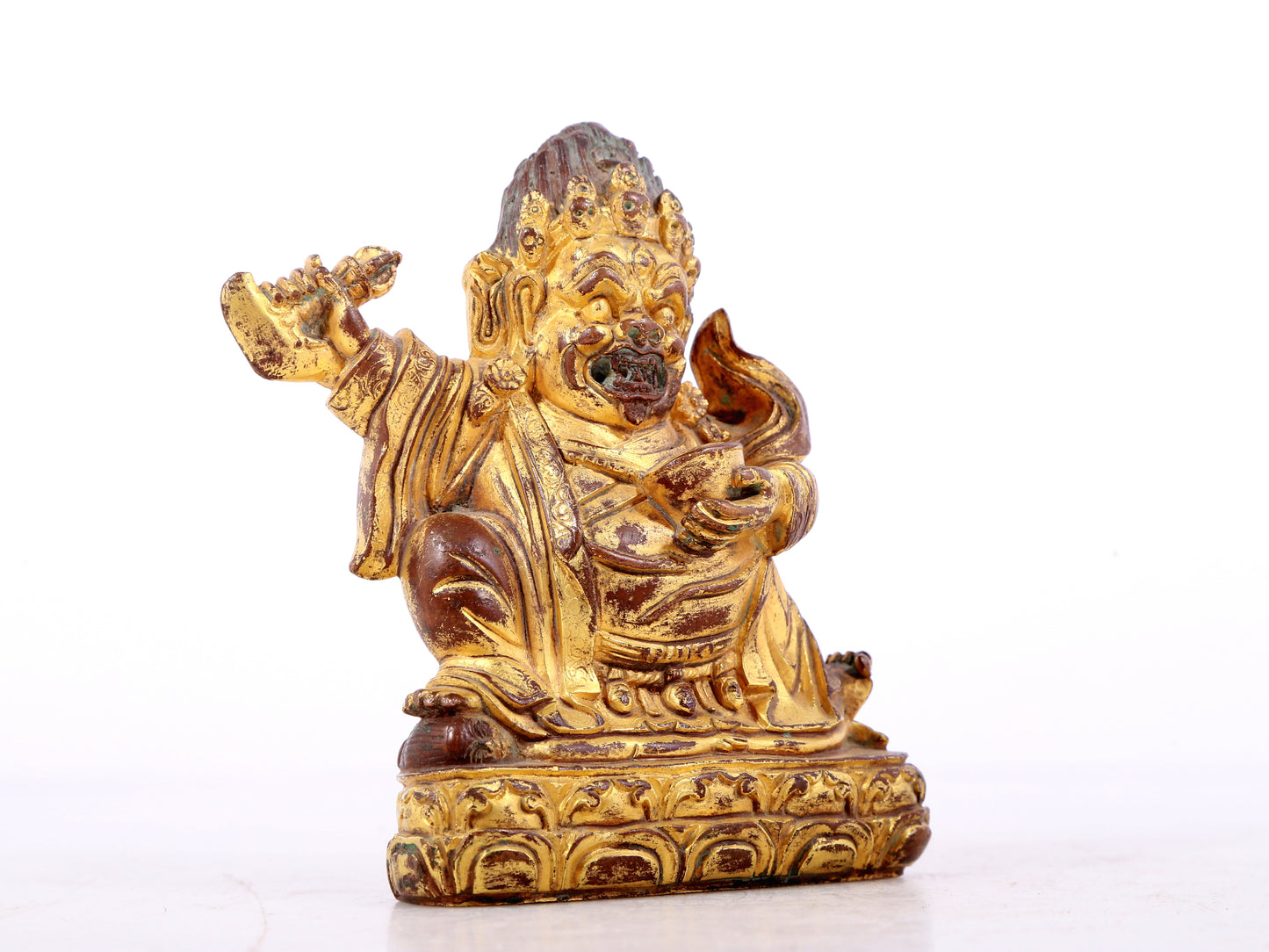 A solemn gilt bronze Vajra statue