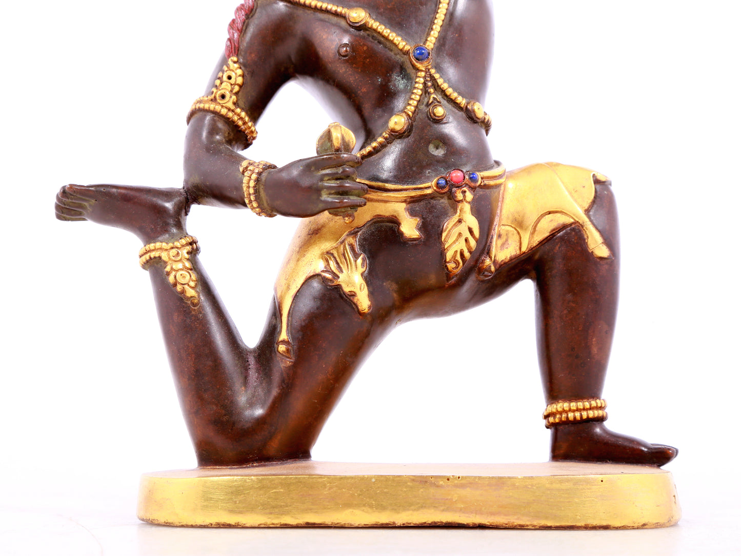 A solemn gilt bronze Vajra statue