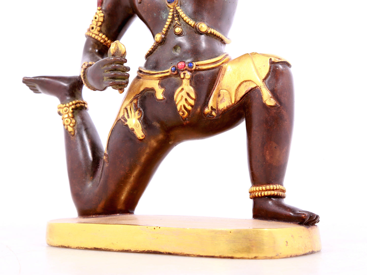 A solemn gilt bronze Vajra statue