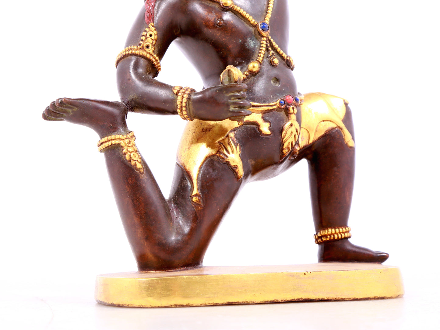 A solemn gilt bronze Vajra statue