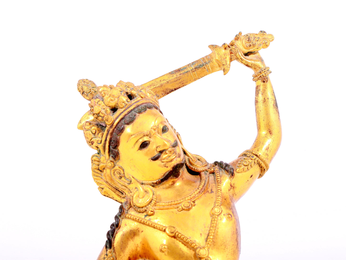 A solemn gilt bronze Vajra statue