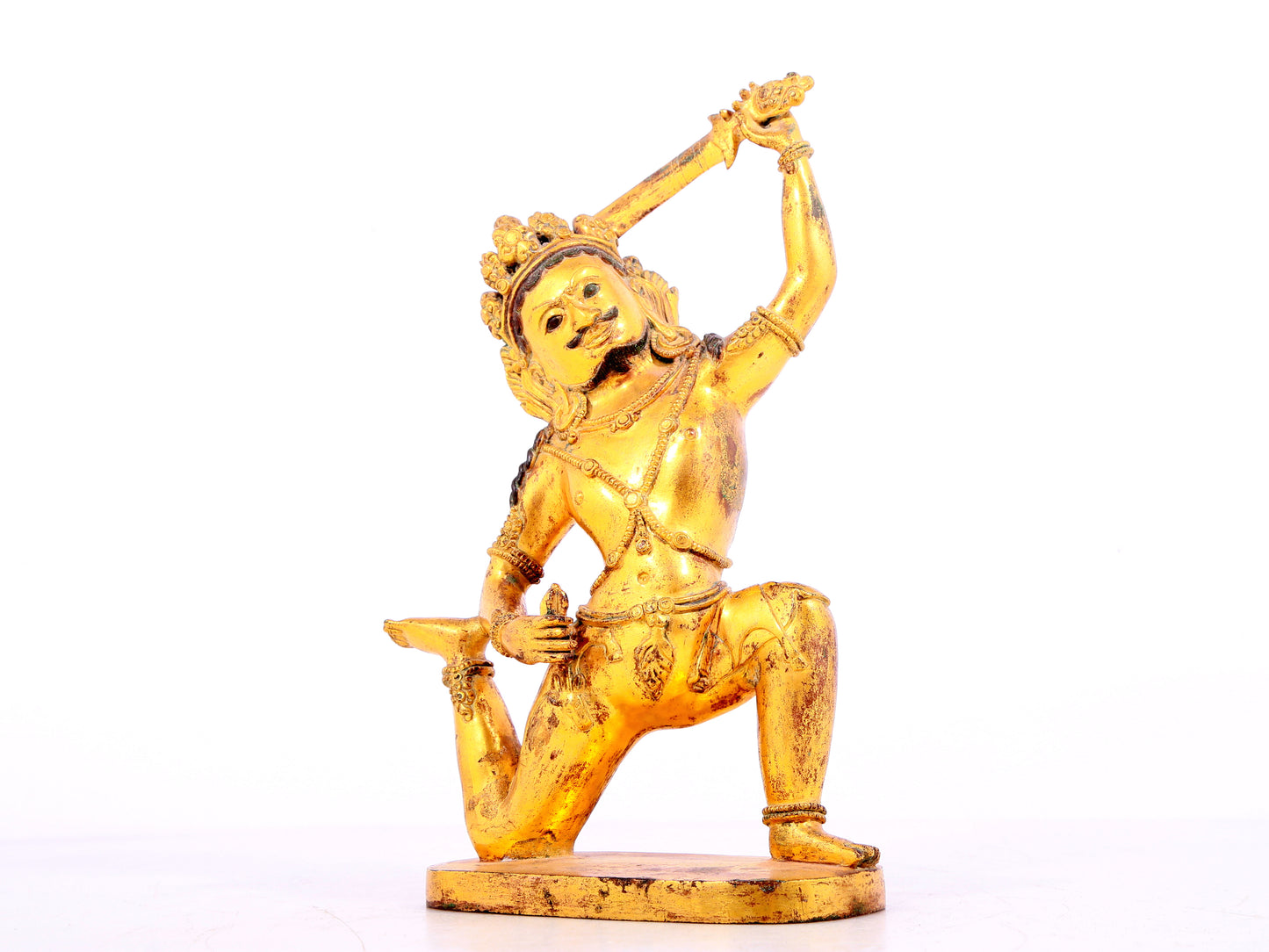 A solemn gilt bronze Vajra statue