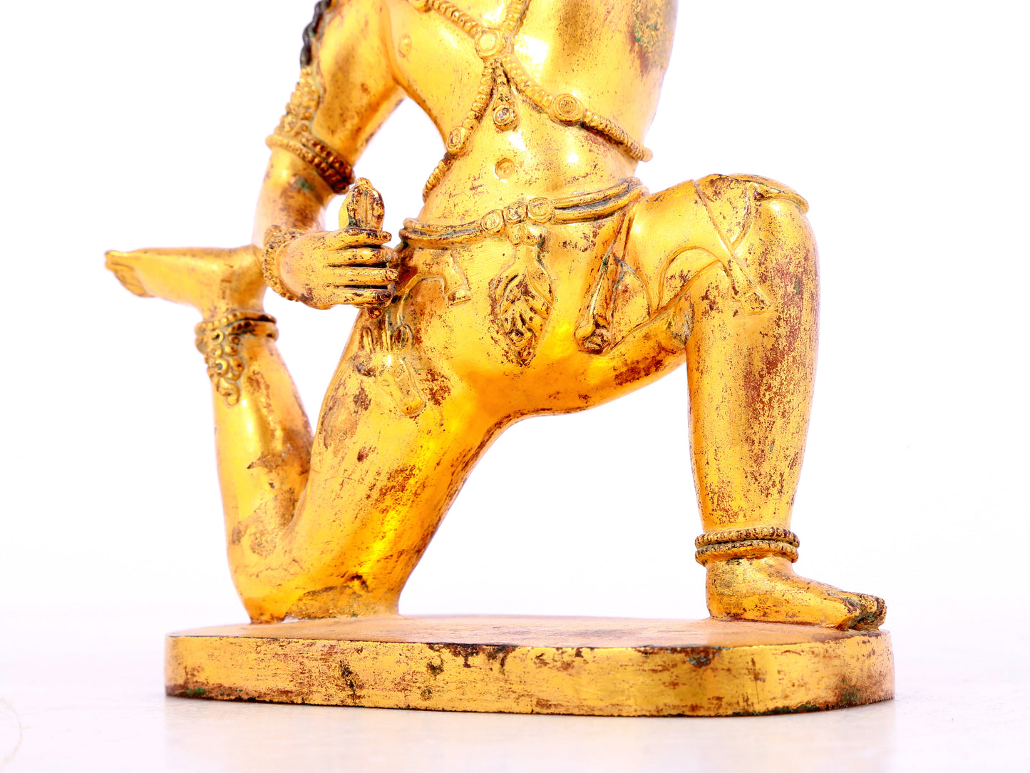A solemn gilt bronze Vajra statue