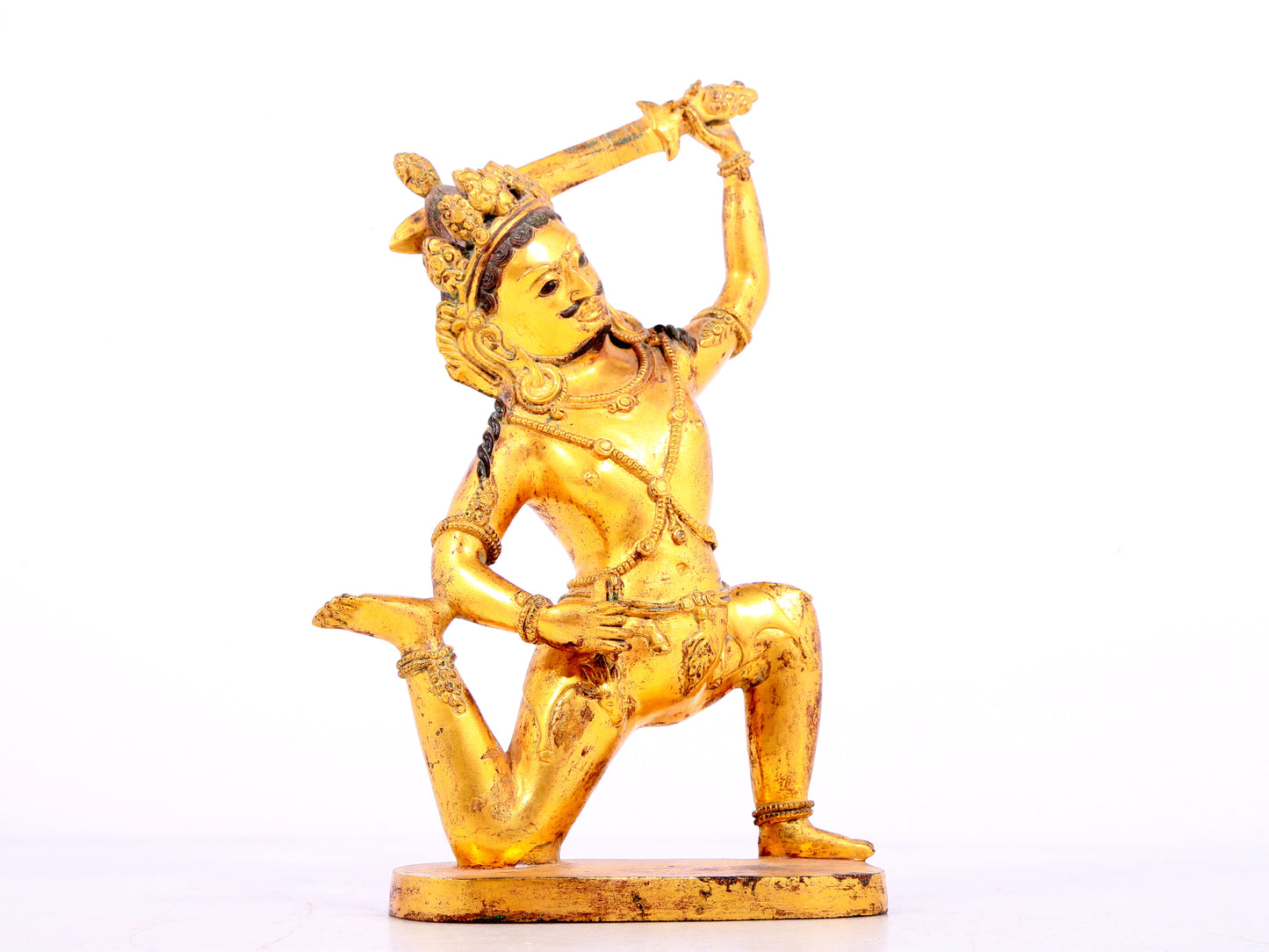 A solemn gilt bronze Vajra statue