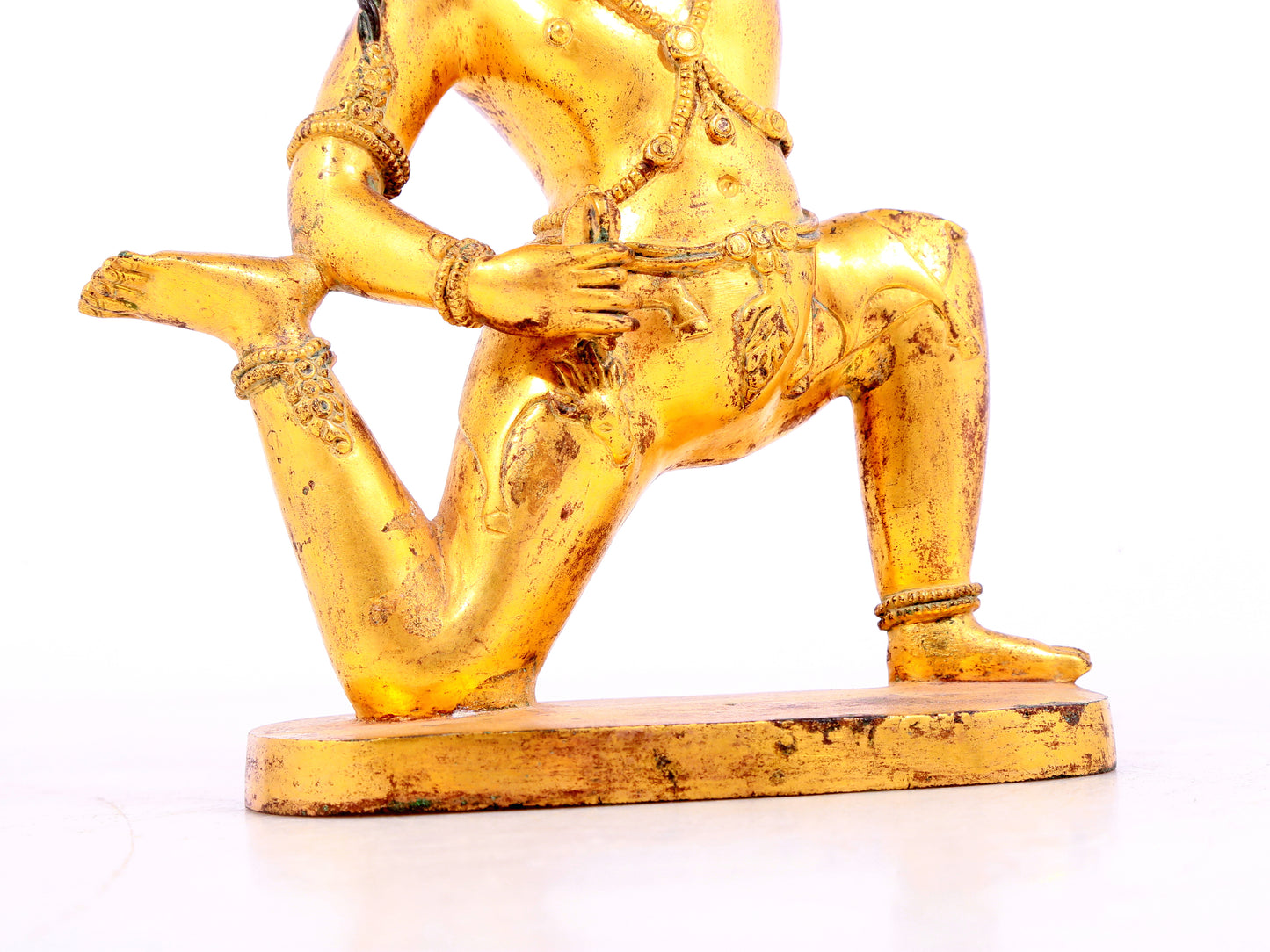 A solemn gilt bronze Vajra statue