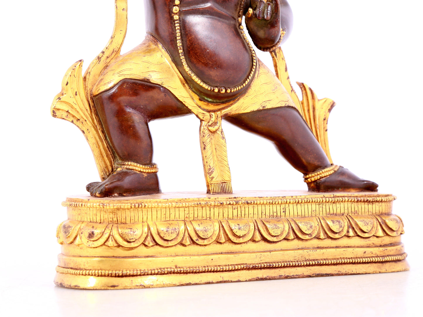 A solemn gilt bronze Vajra statue
