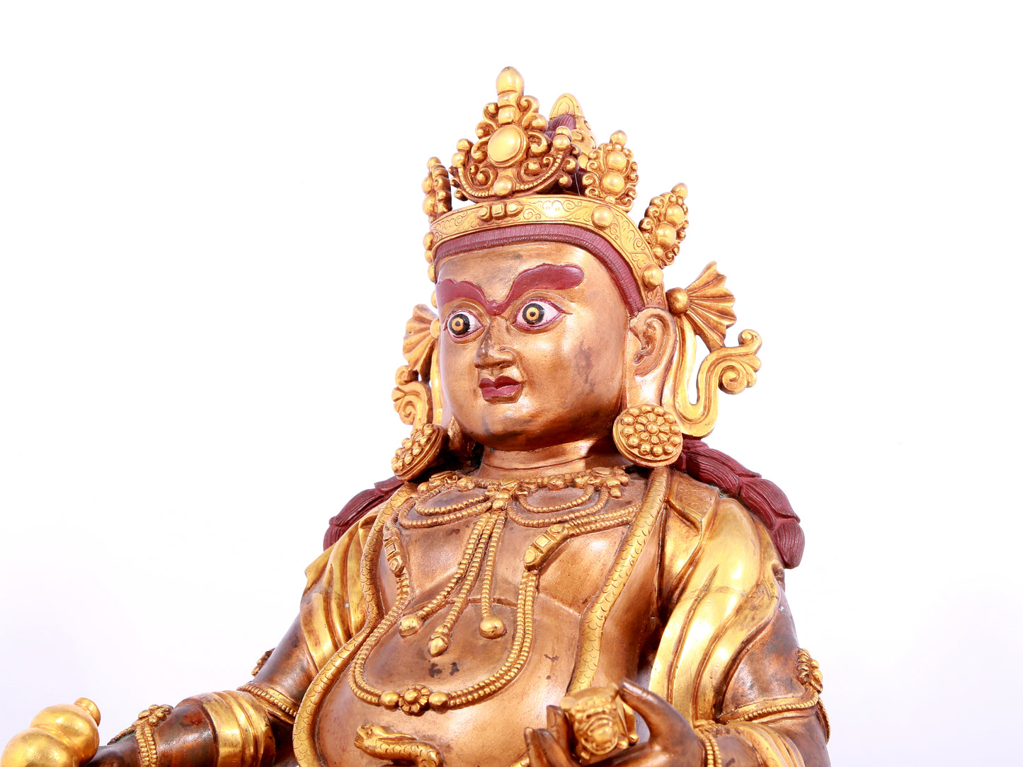 A solemn gilt bronze statue of Mammon