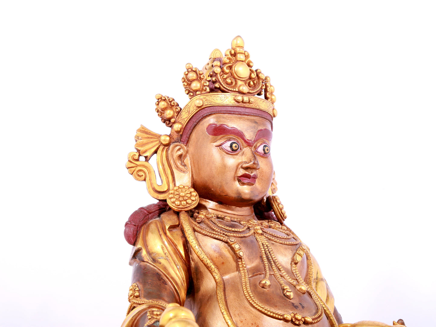 A solemn gilt bronze statue of Mammon
