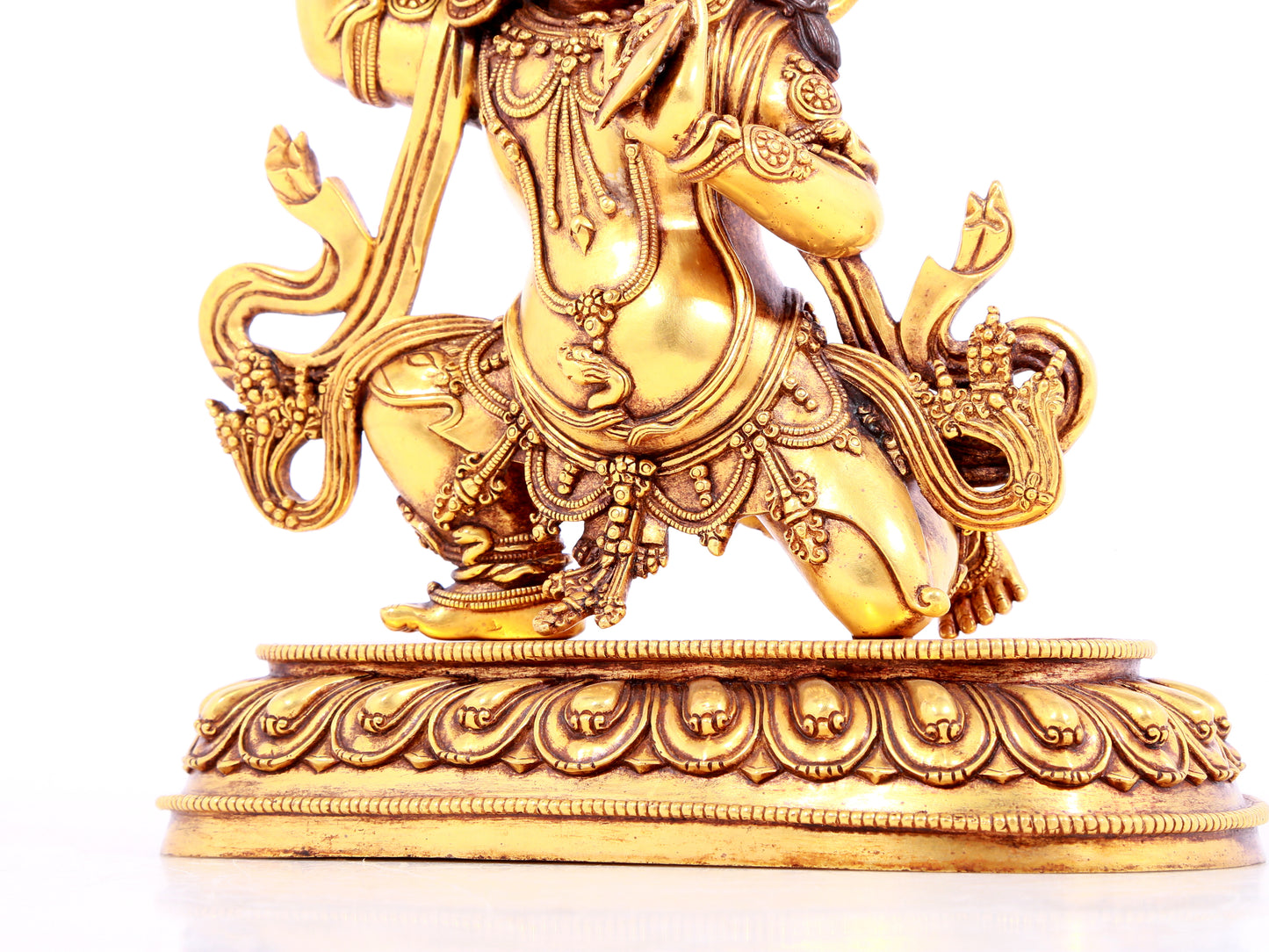 A solemn gilt bronze Vajra statue