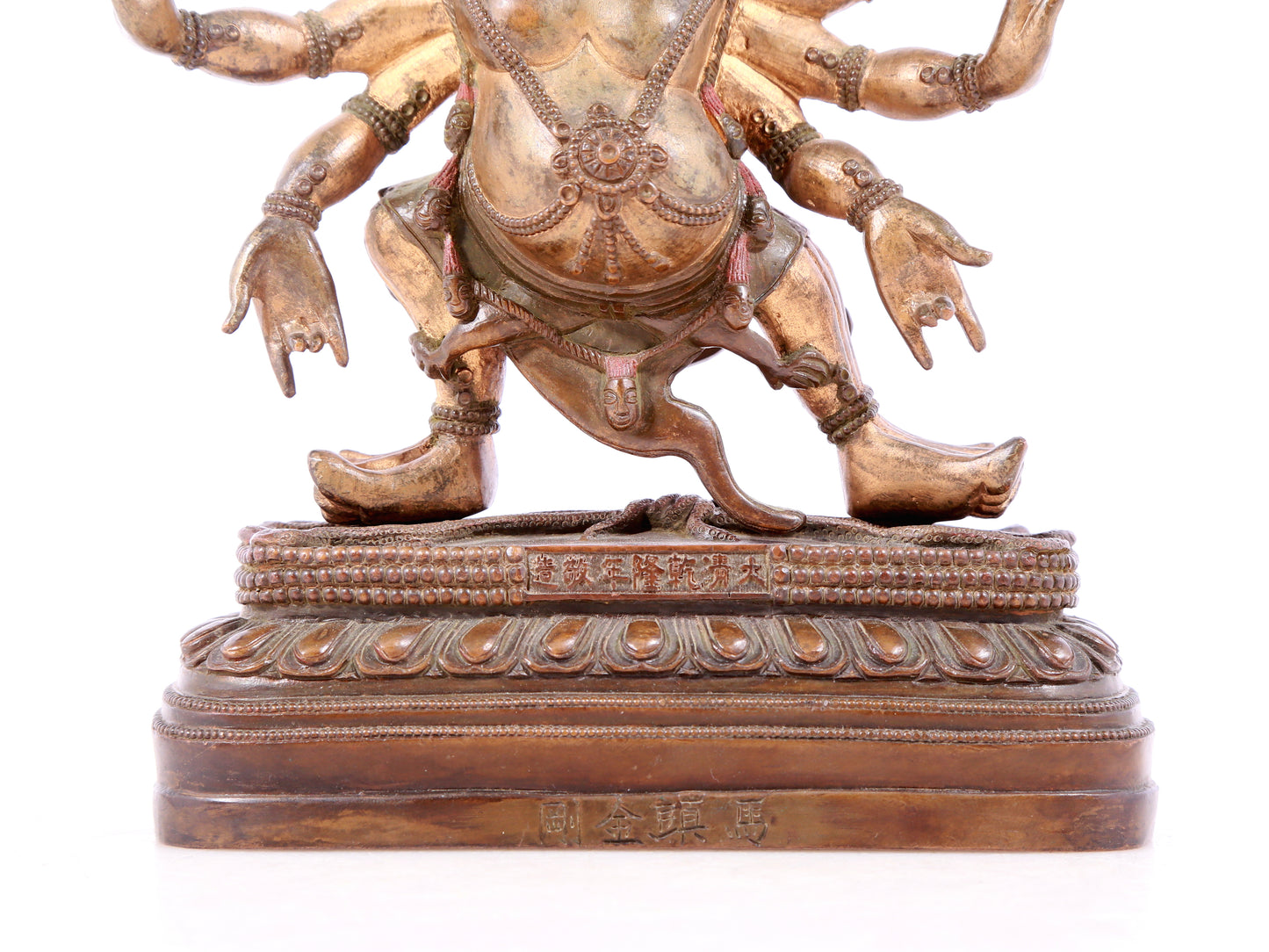 A solemn gilt bronze Vajra statue
