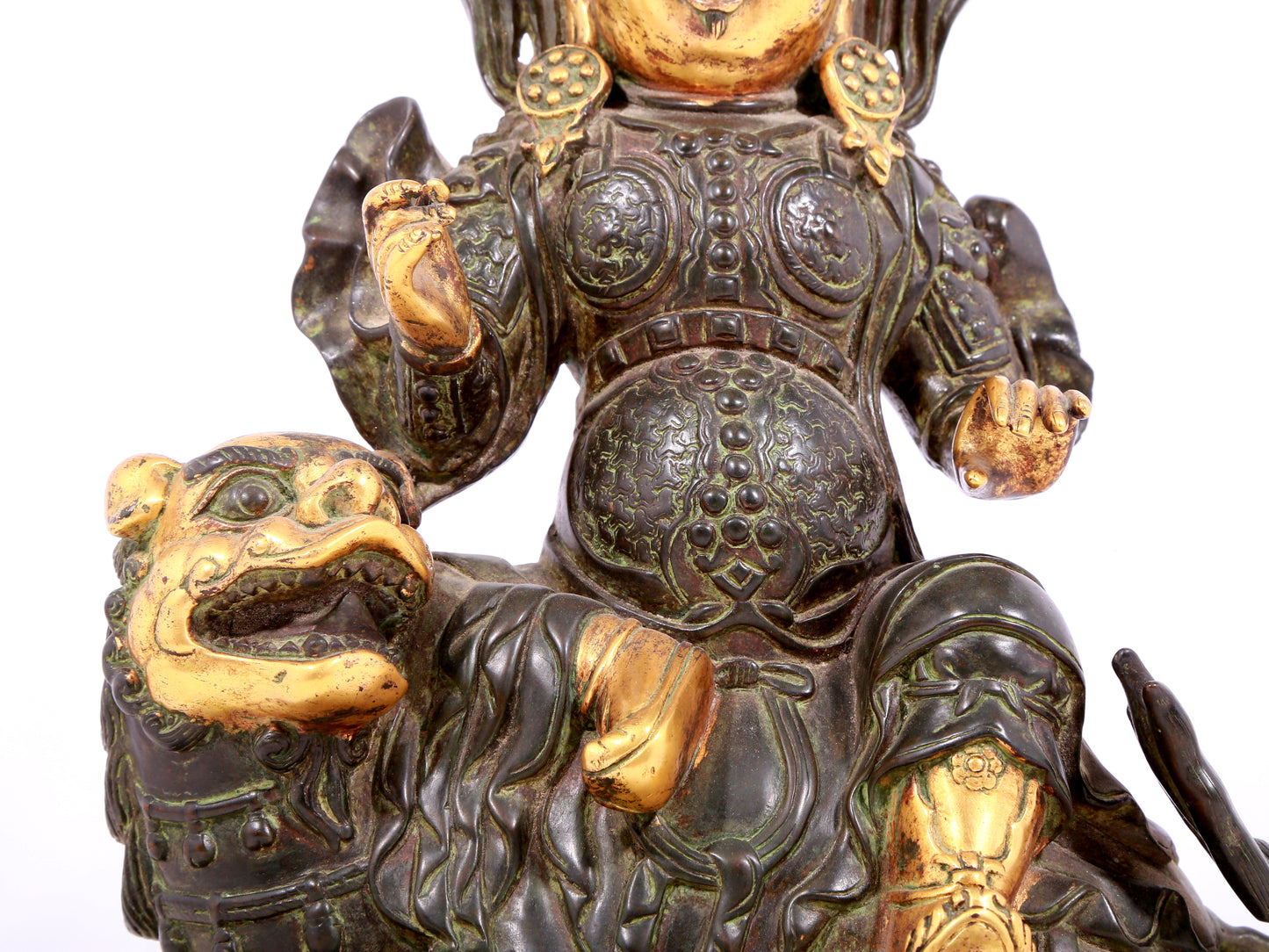 A solemn gilt bronze statue of the King of Treasures