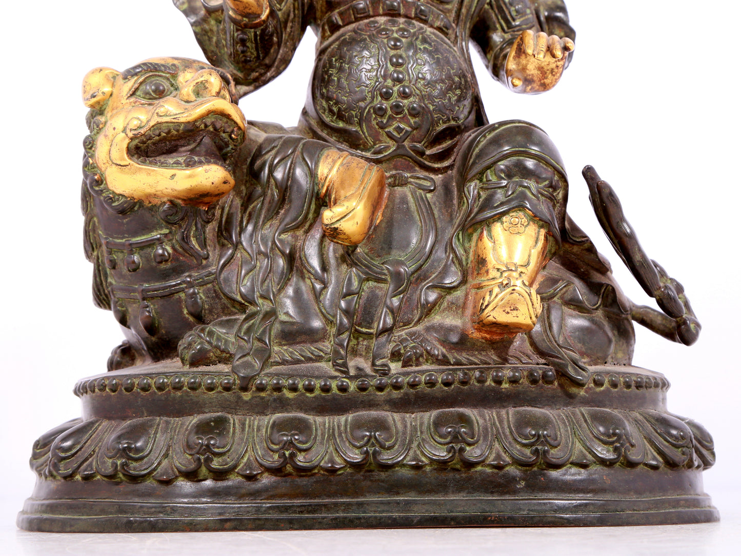 A solemn gilt bronze statue of the King of Treasures