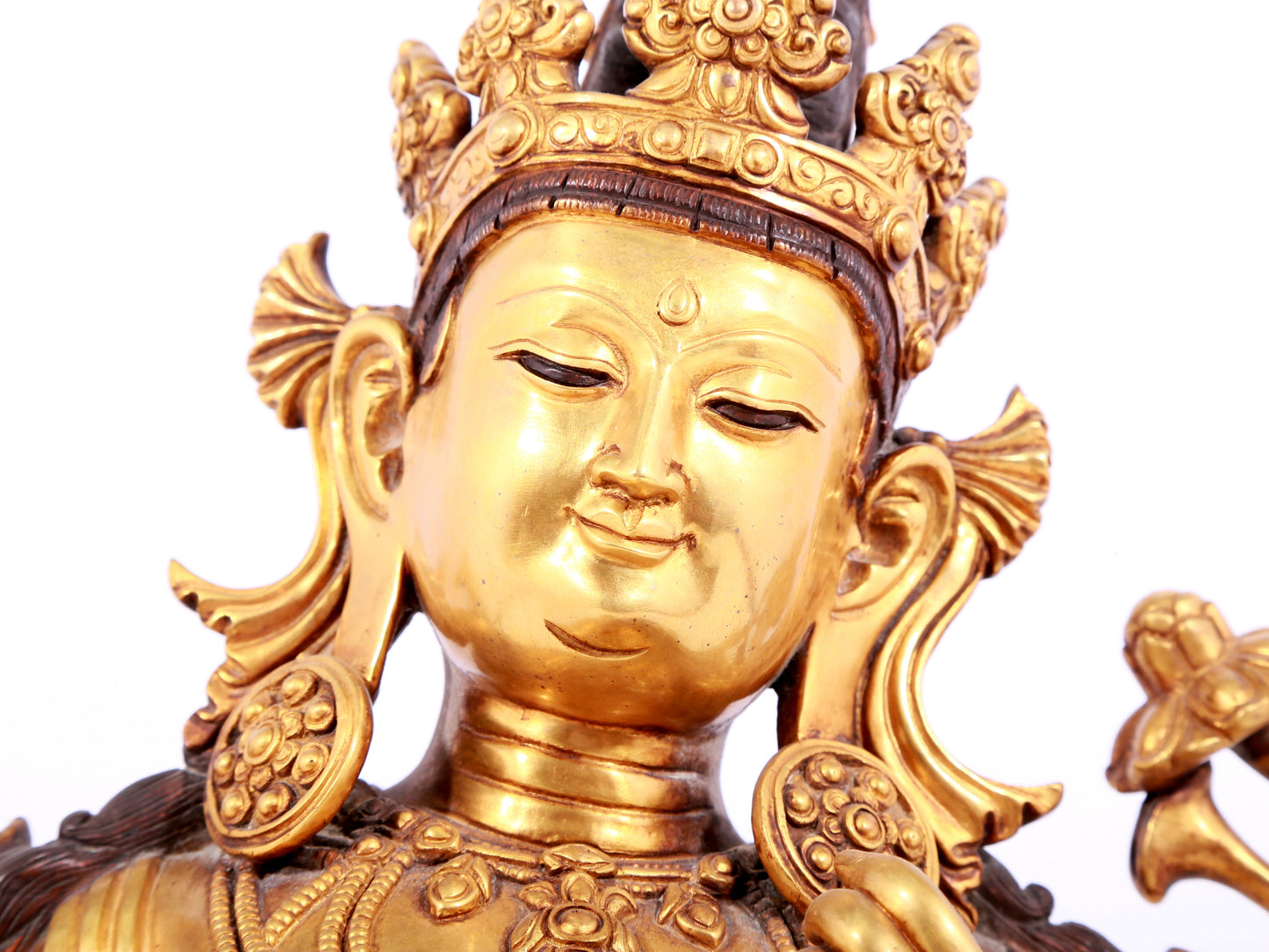 A solemn gilt copper green tara