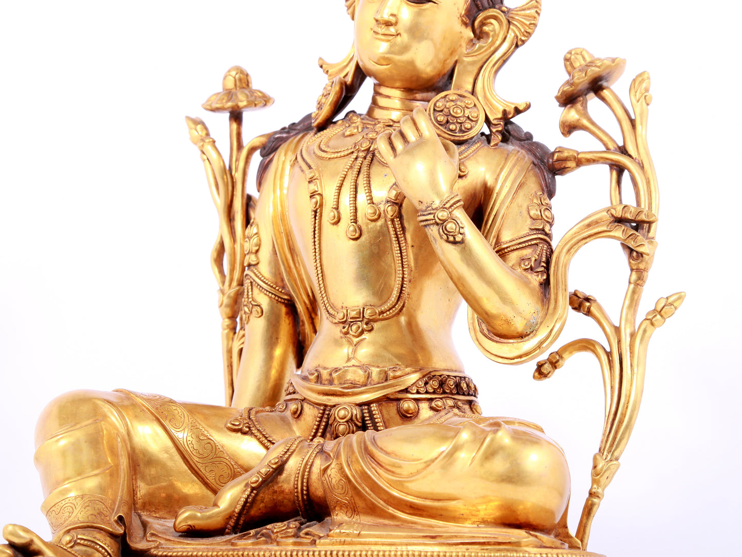 A solemn gilt copper green tara