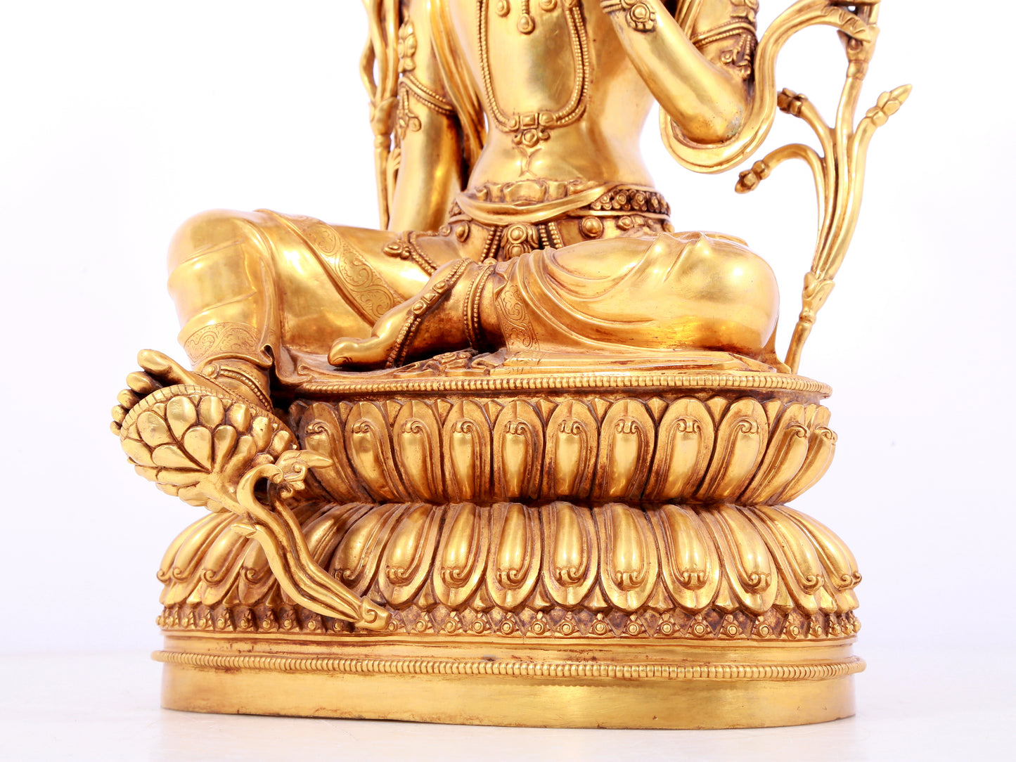 A solemn gilt copper green tara