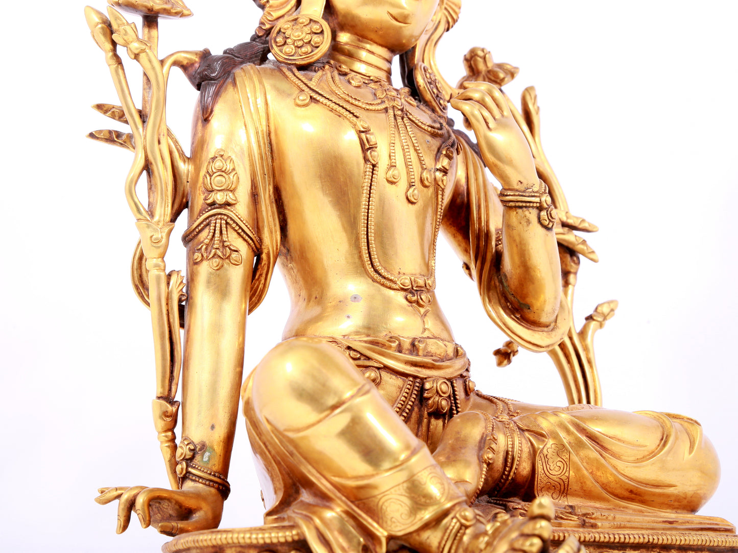 A solemn gilt copper green tara