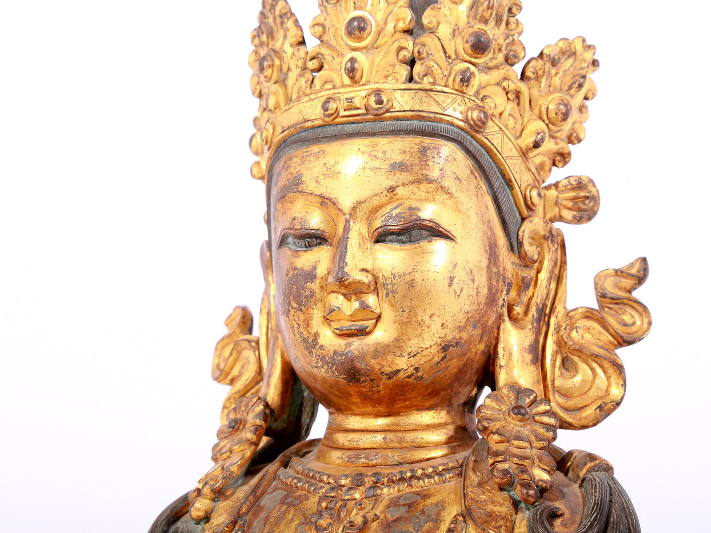 A solemn gilt bronze statue of Bodhisattva