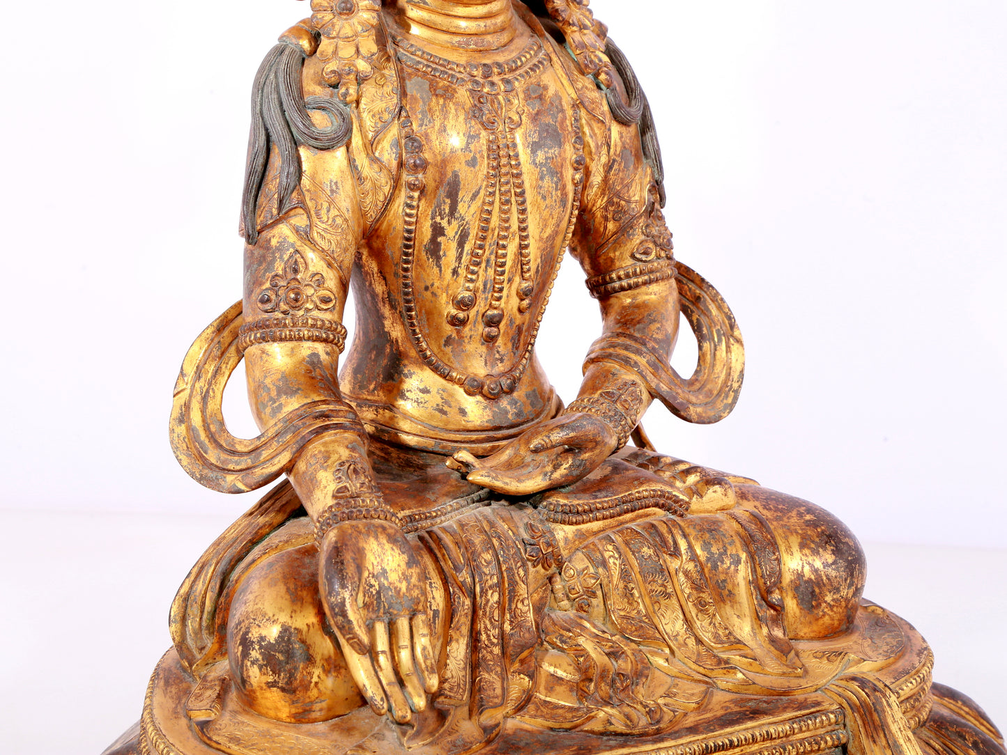 A solemn gilt bronze statue of Bodhisattva