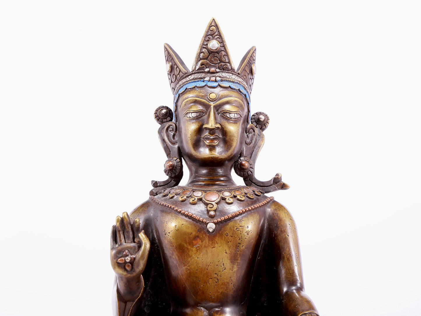 An alloy copper inlaid silver Buddha statue