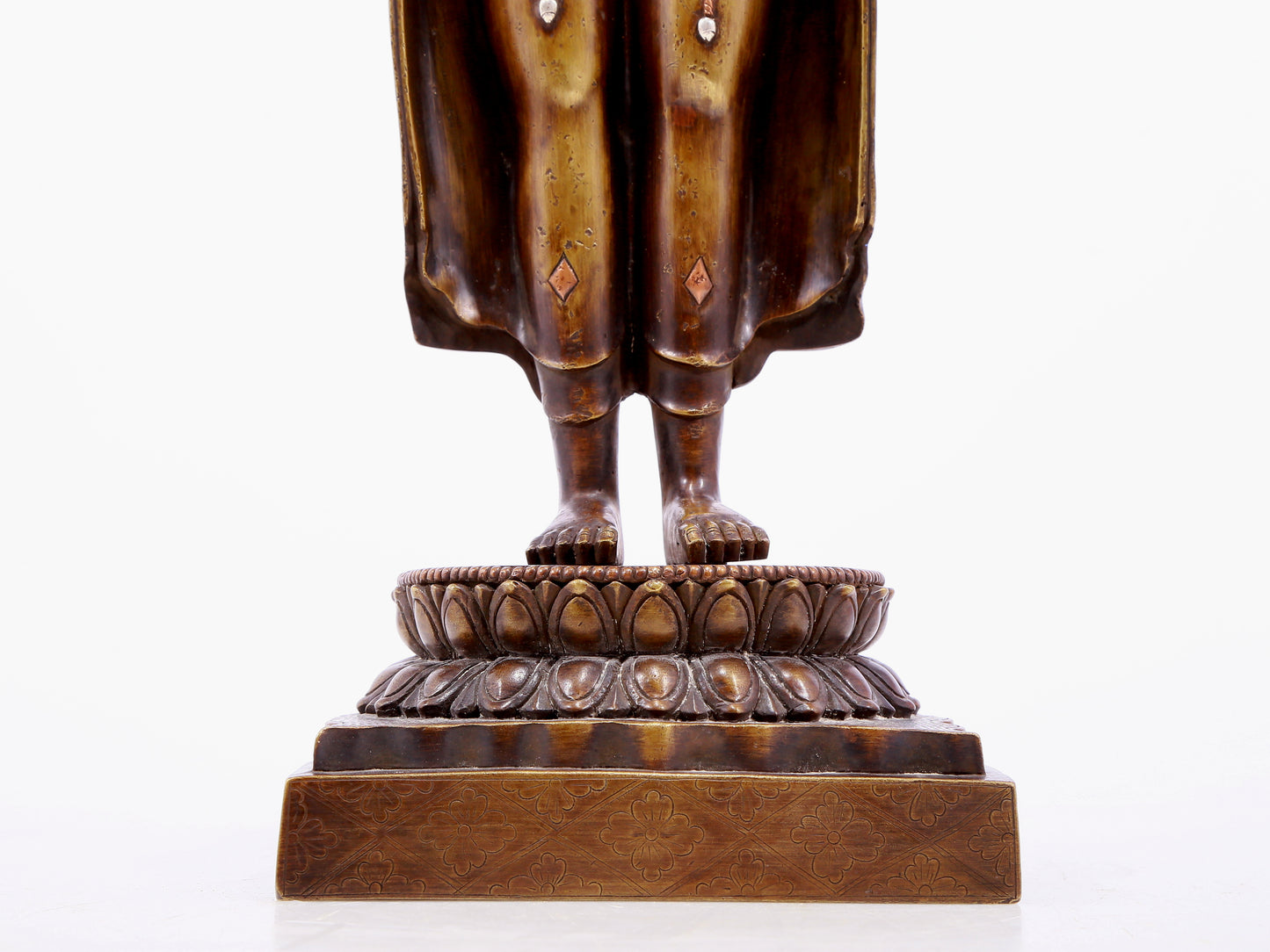 An alloy copper inlaid silver Buddha statue