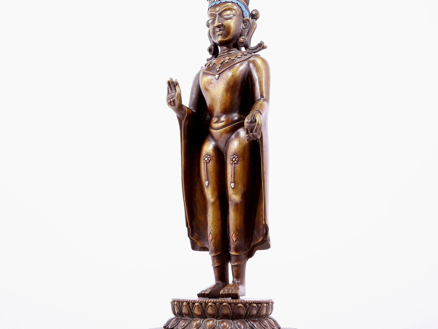 An alloy copper inlaid silver Buddha statue