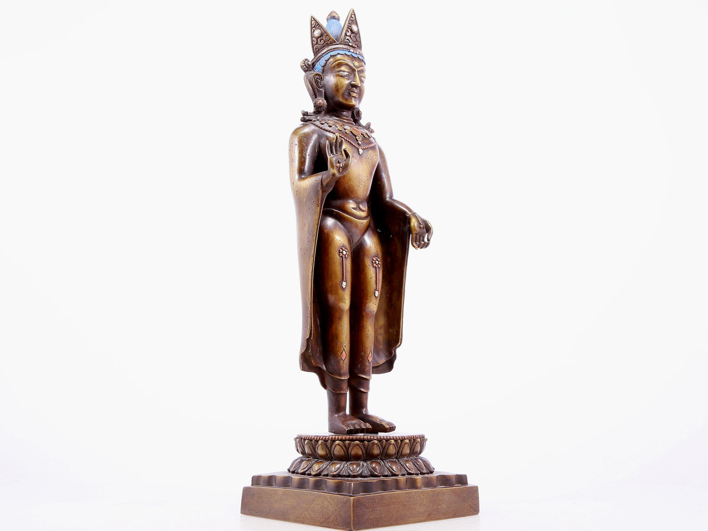 An alloy copper inlaid silver Buddha statue