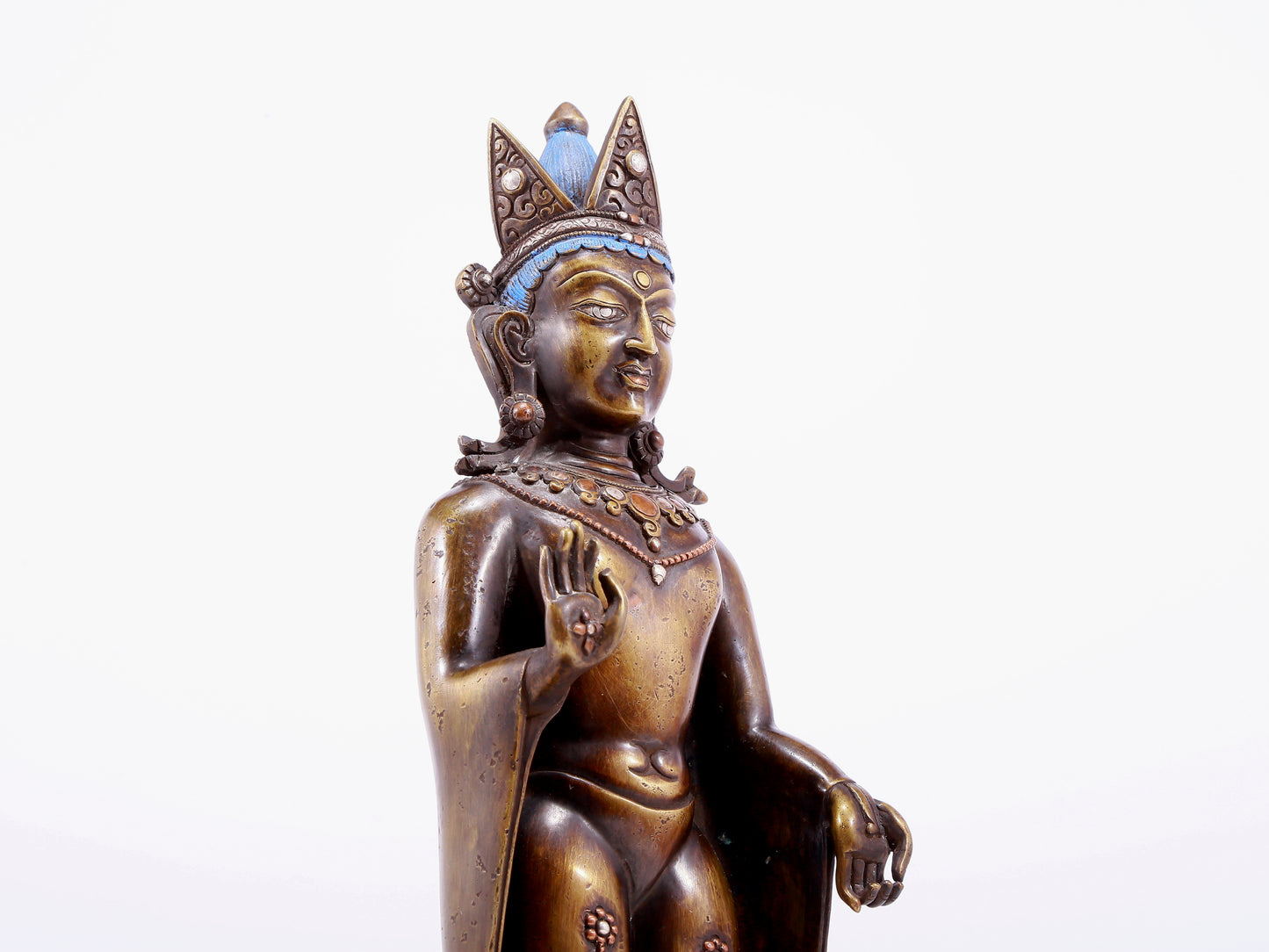 An alloy copper inlaid silver Buddha statue