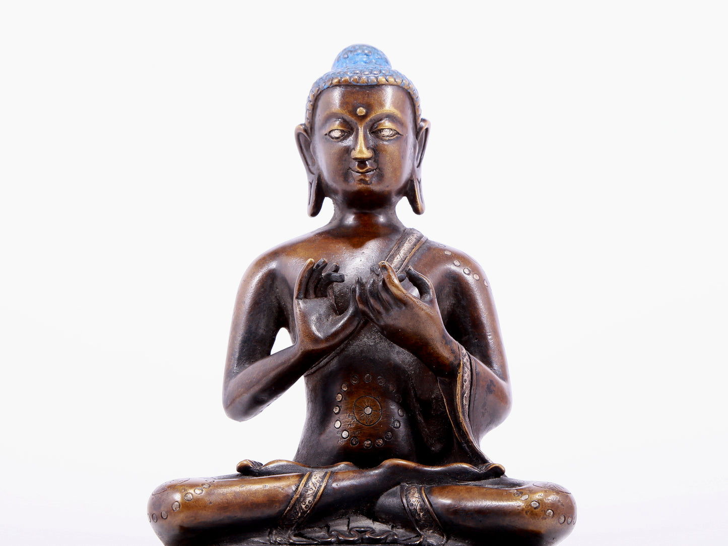 An alloy copper inlaid silver statue of Gautama Buddha