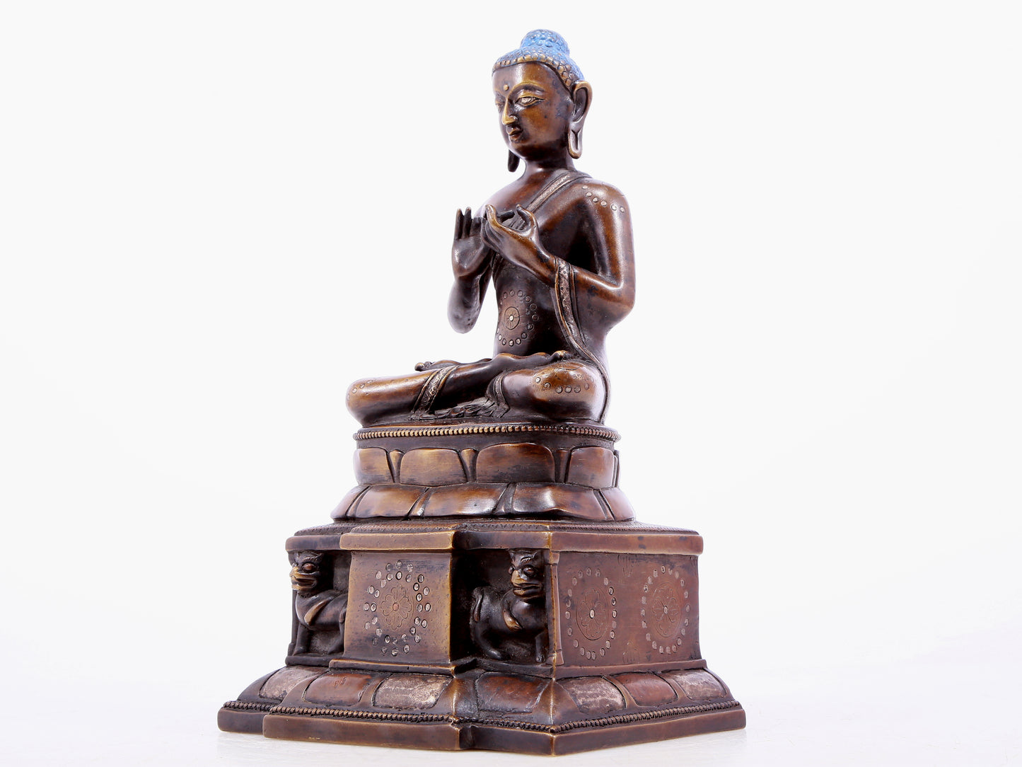 An alloy copper inlaid silver statue of Gautama Buddha