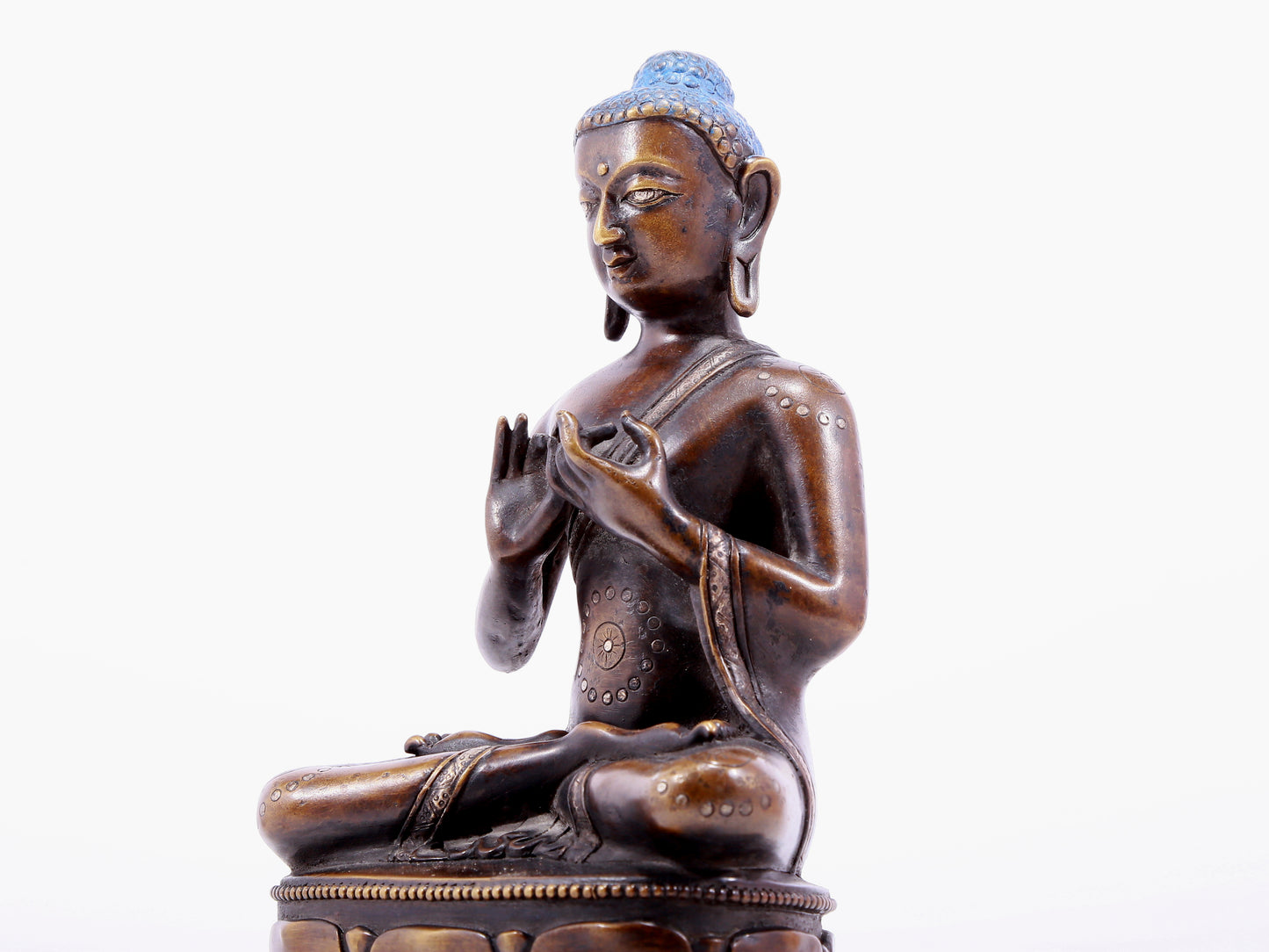 An alloy copper inlaid silver statue of Gautama Buddha