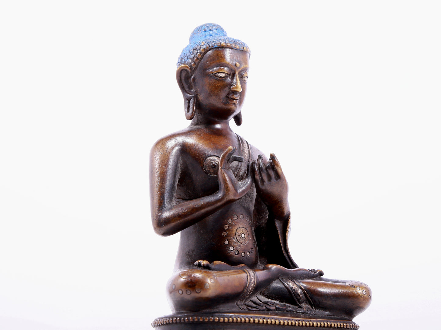 An alloy copper inlaid silver statue of Gautama Buddha