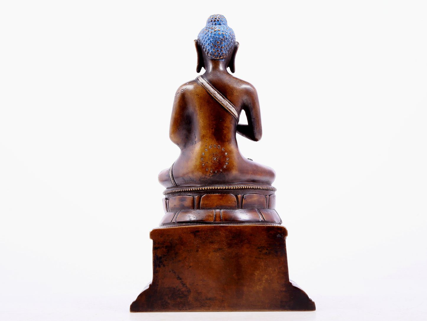 An alloy copper inlaid silver statue of Gautama Buddha