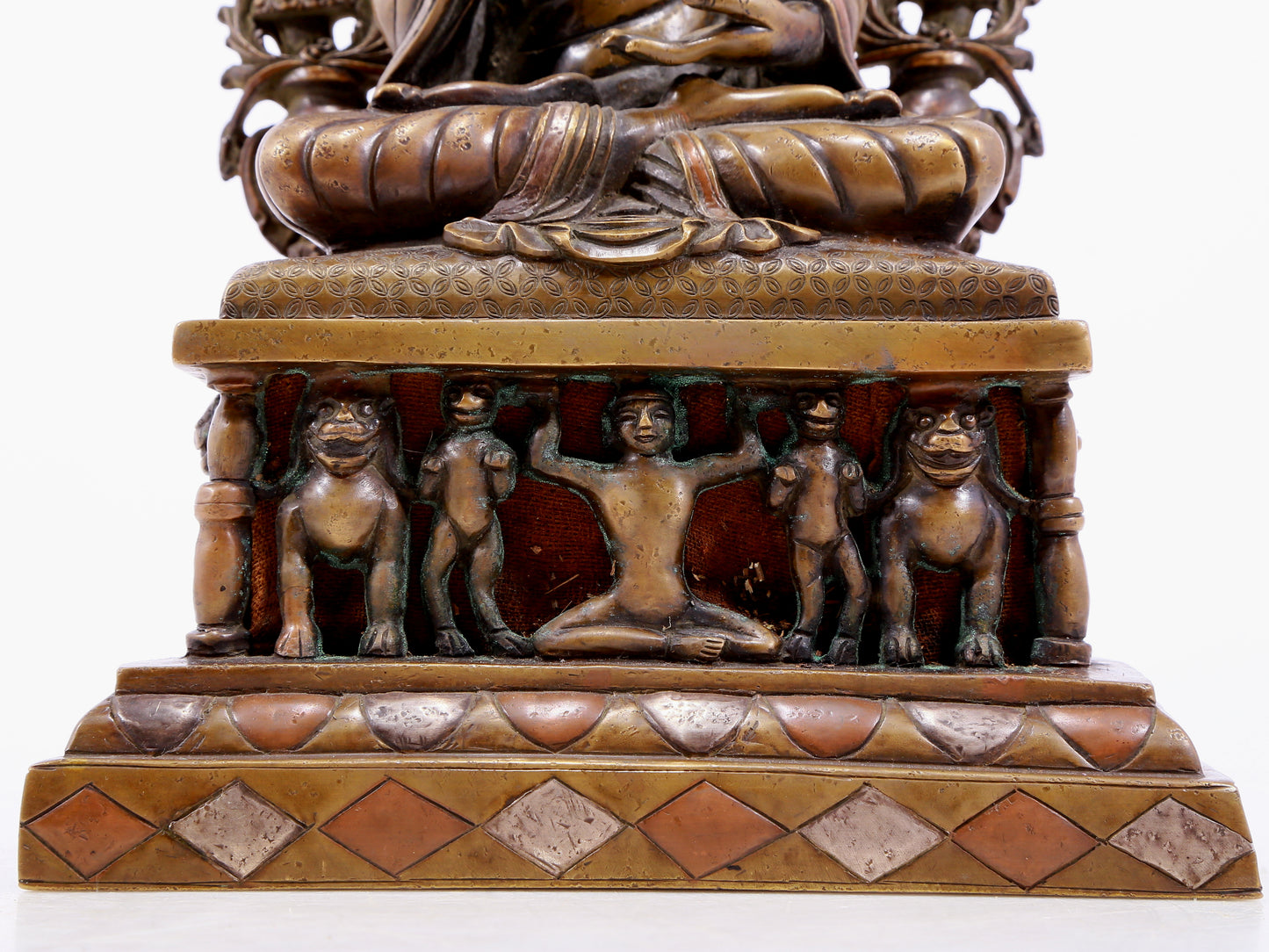 An Archaic Alloy-Copper Silver-Inlaid Figure Of Buddha Shakyamuni