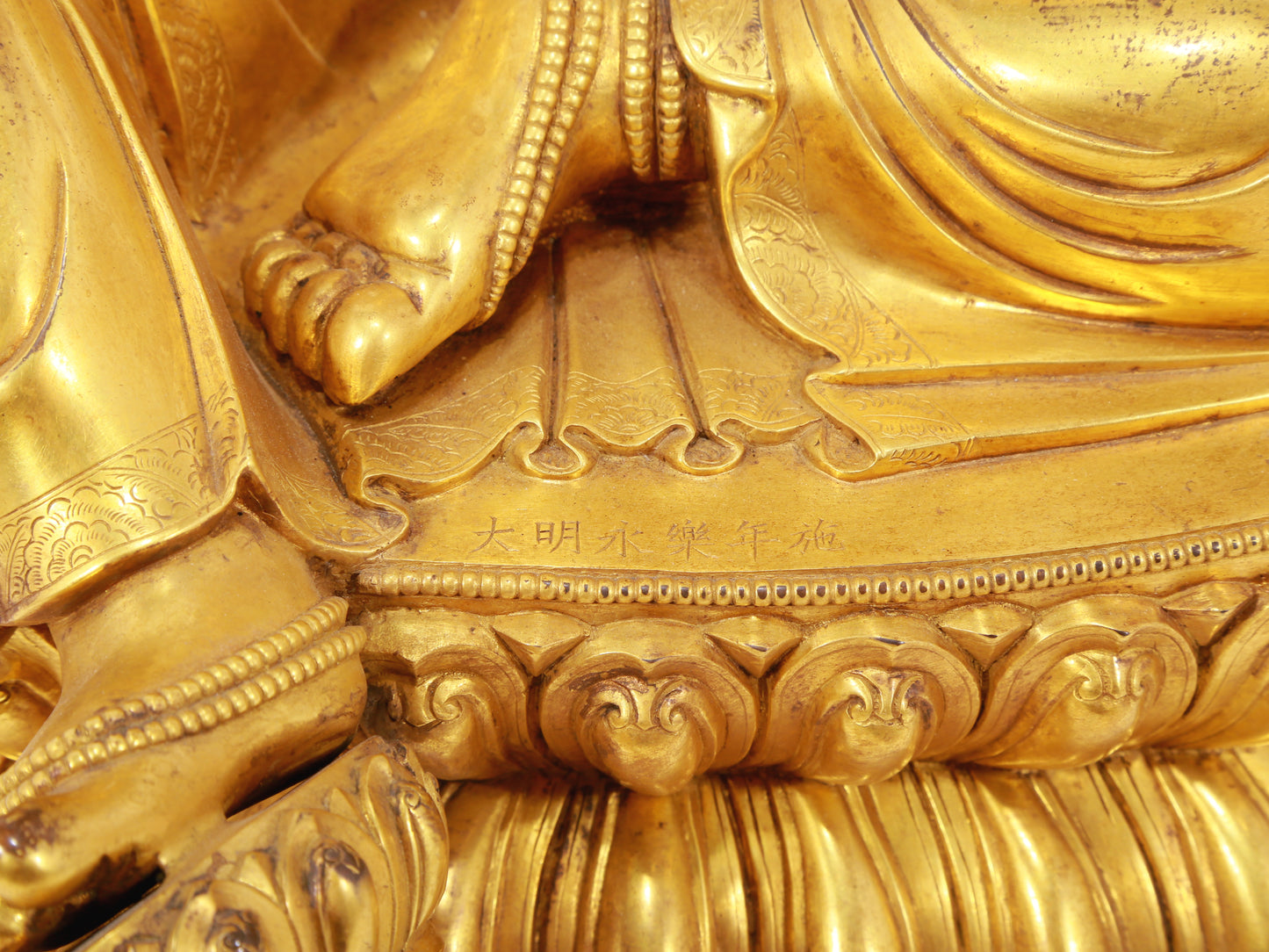 A stunning gilt bronze green Tara statue