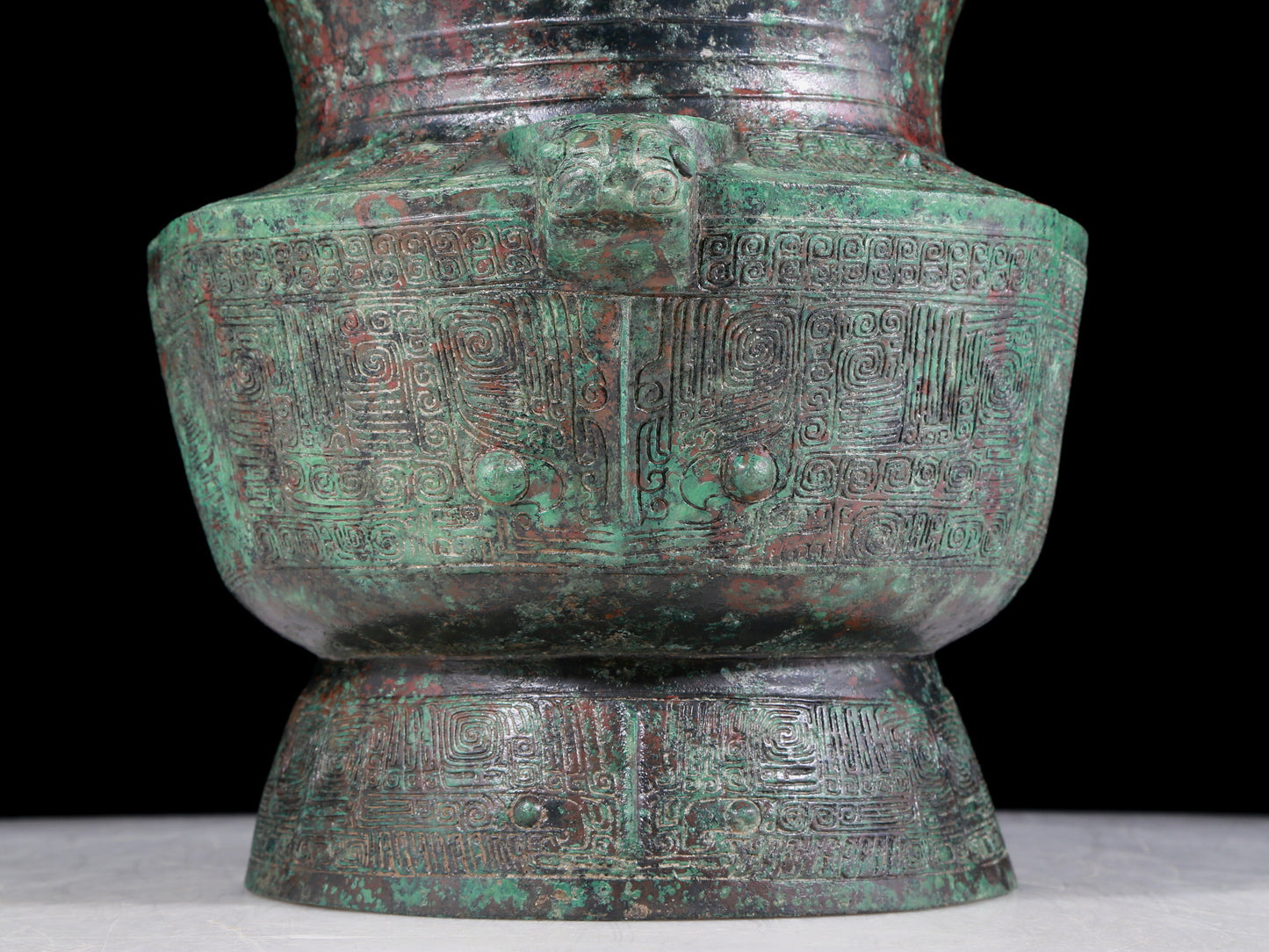 A precious bronze animal mask bottle