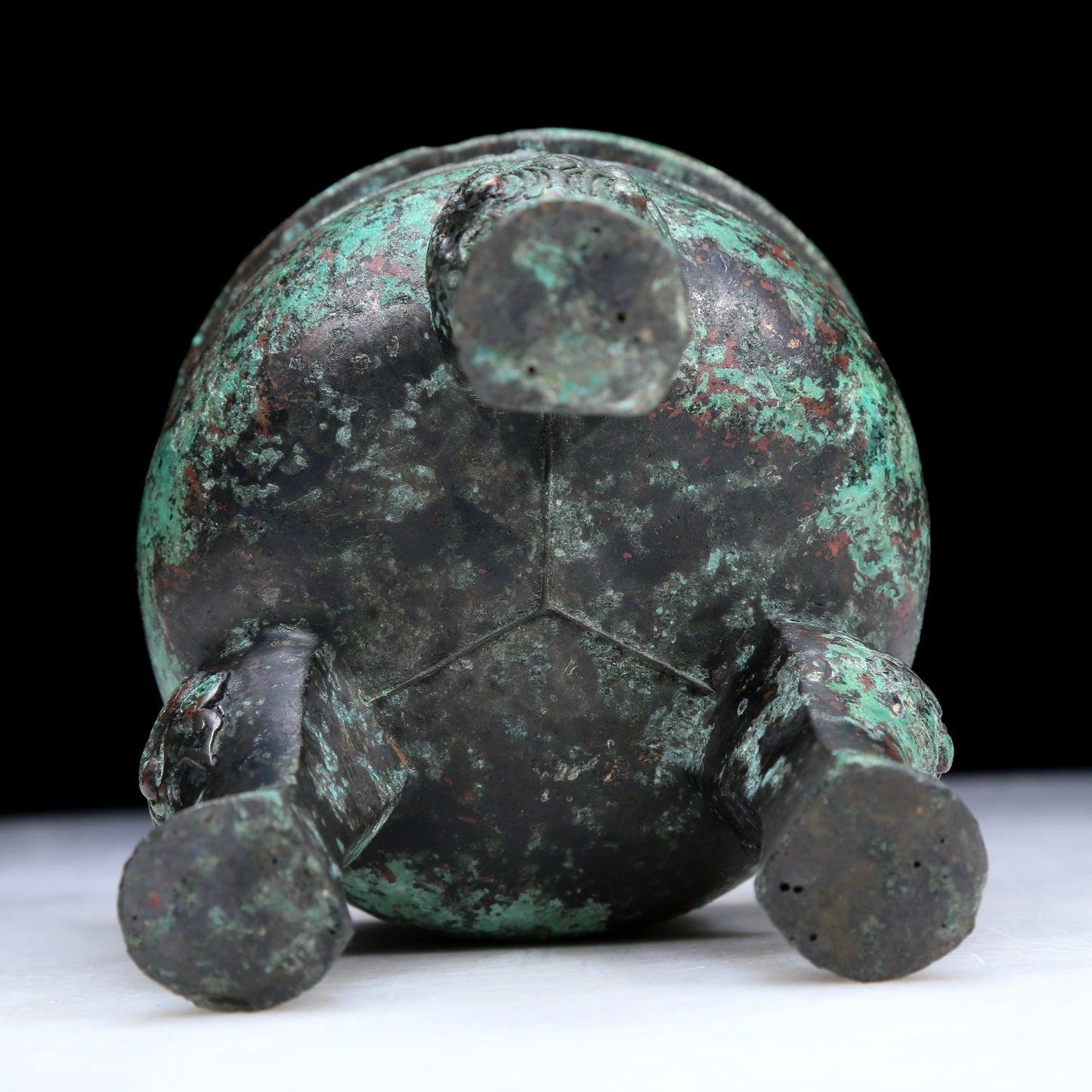 An Archaic Bronze 'Auspicious Beast' Tripod Censer