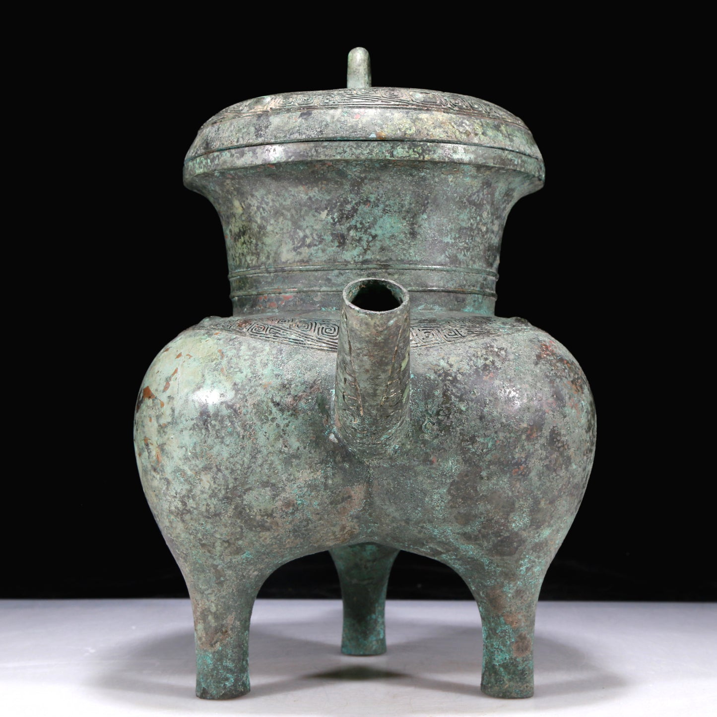 An Excellent Bronze 'Auspicious Beast' Tripod Ewer