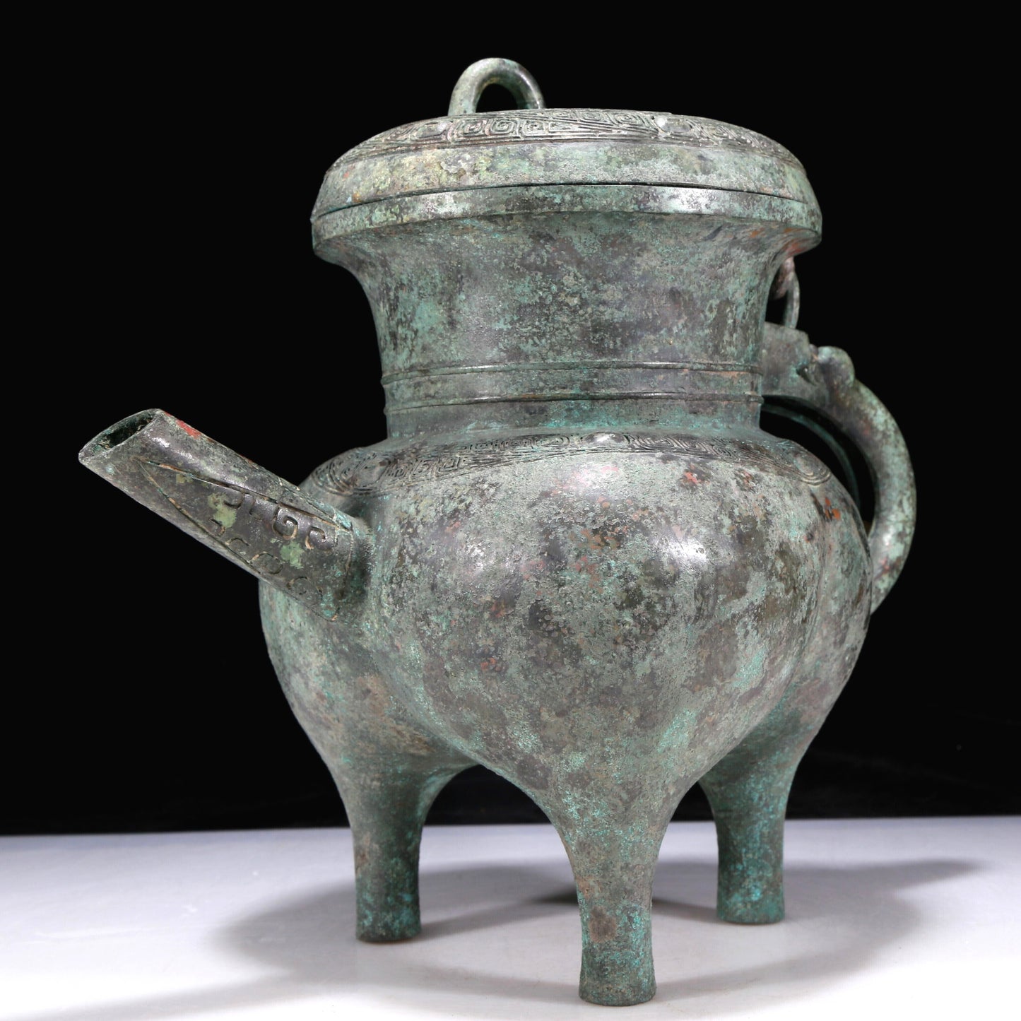 An Excellent Bronze 'Auspicious Beast' Tripod Ewer