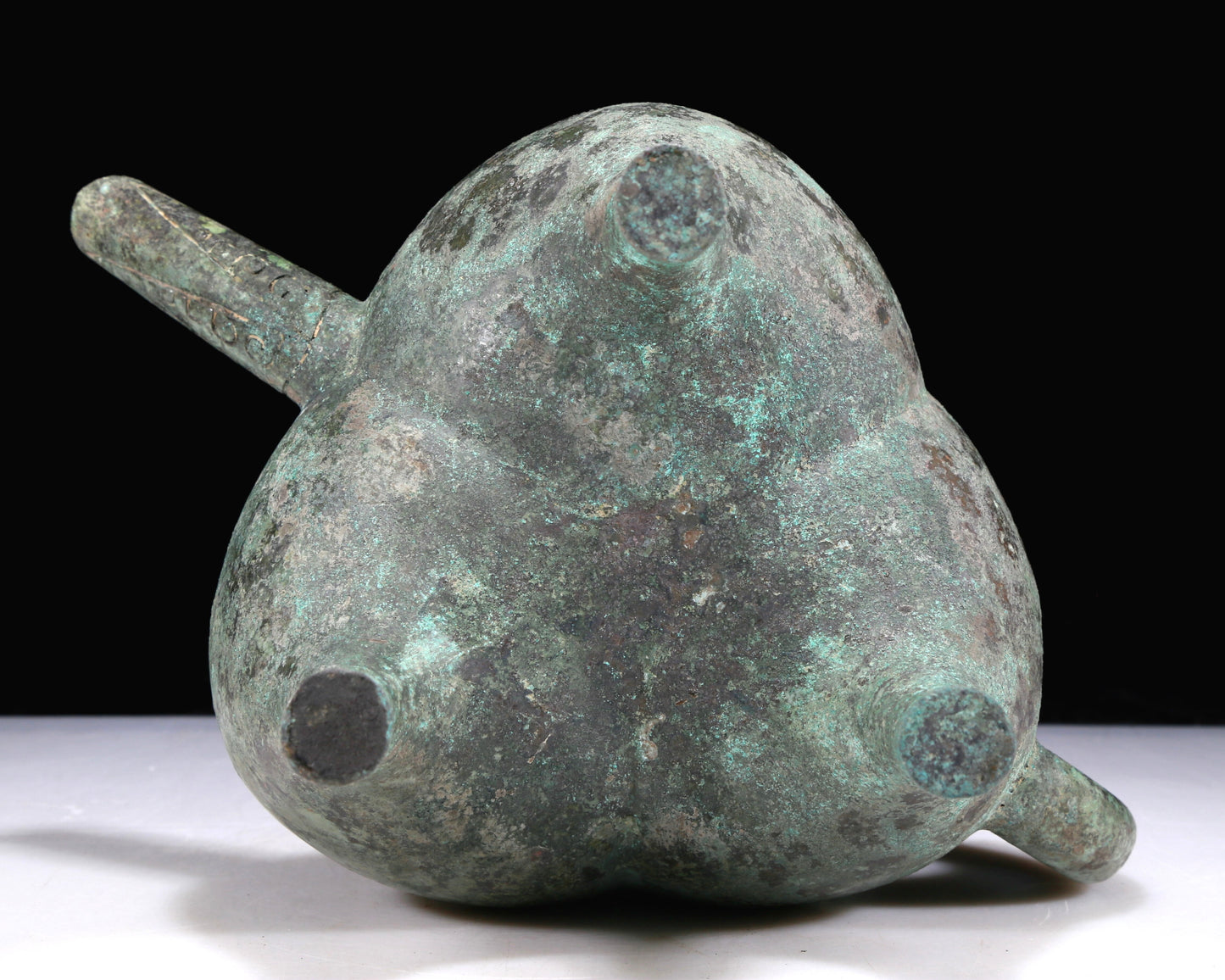 An Excellent Bronze 'Auspicious Beast' Tripod Ewer