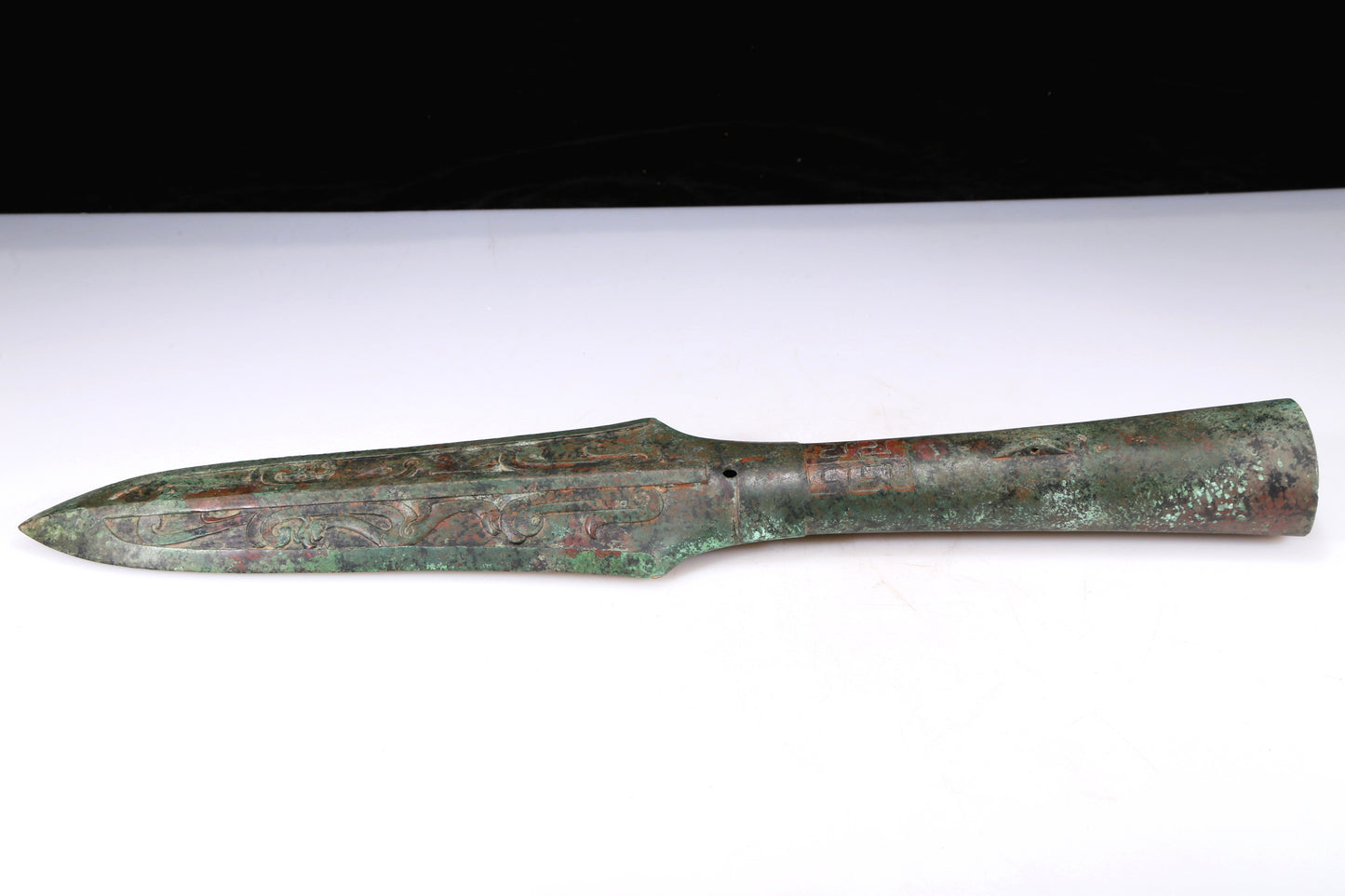 An Archaic Bronze 'Dragon' Weapon